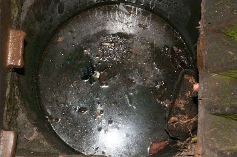 Maurice Robinson’s mobile phone in a drain (Essex Police/PA)