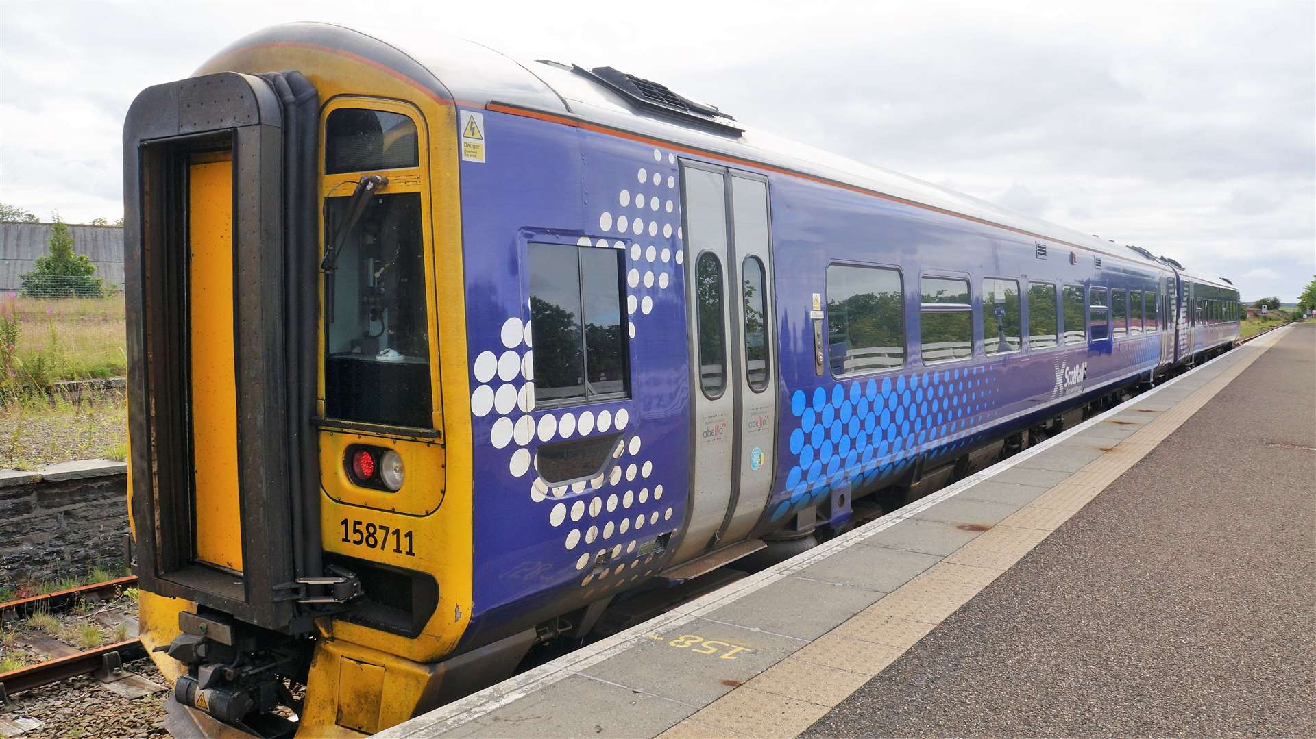 A ScotRail train at Wick station. The company is restoring its full summer timetable this week. Picture: DGS