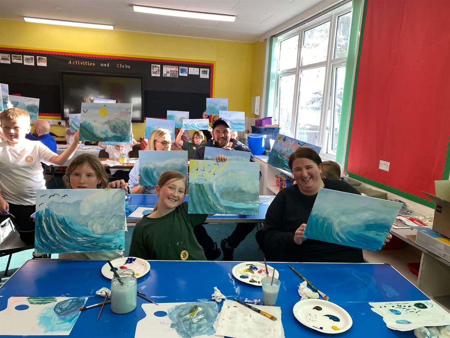 Children in P5 to P7, and family members, were taught by Lisa how to paint a wave.