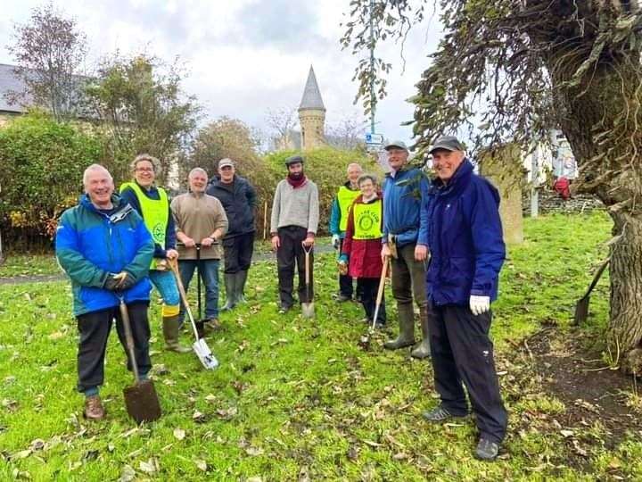 Crocus flowers are abundant in this area of Thurso thanks to Alexander Glasgow (rear centre) and Thurso's Rotary Club last October. Picture supplied