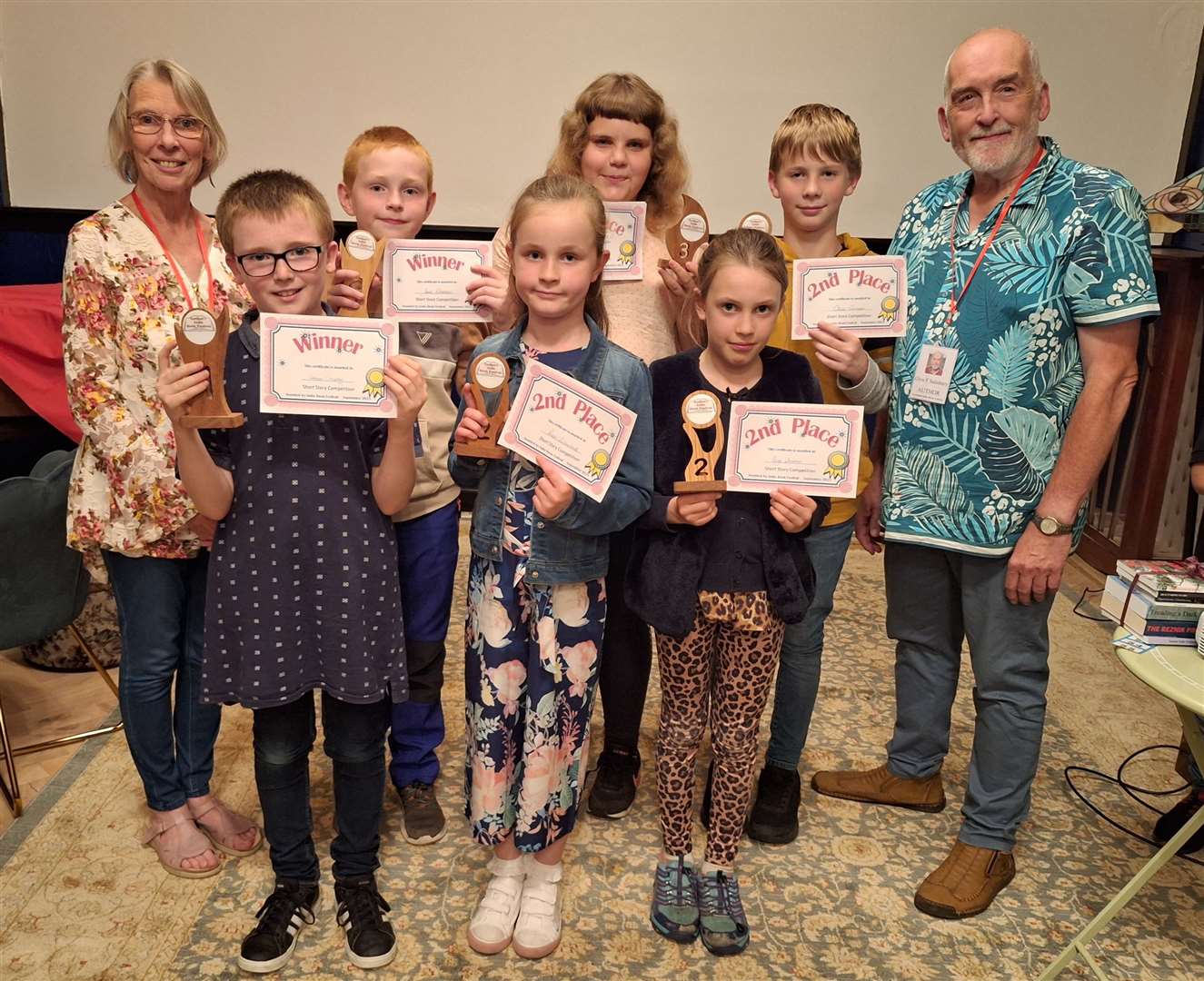 Glyn Salisbury and Carolyn Bilyard with winners from Caithness who were present to receive their awards and certificates on the night. Back row, from left: Jack Robertson, Larissa McPhee and Oliver Currums, all Castletown. Front row, from left: Connor Crossley, Watten, Reese Sutherland, Wick and Paige Stoneman, Castletown.