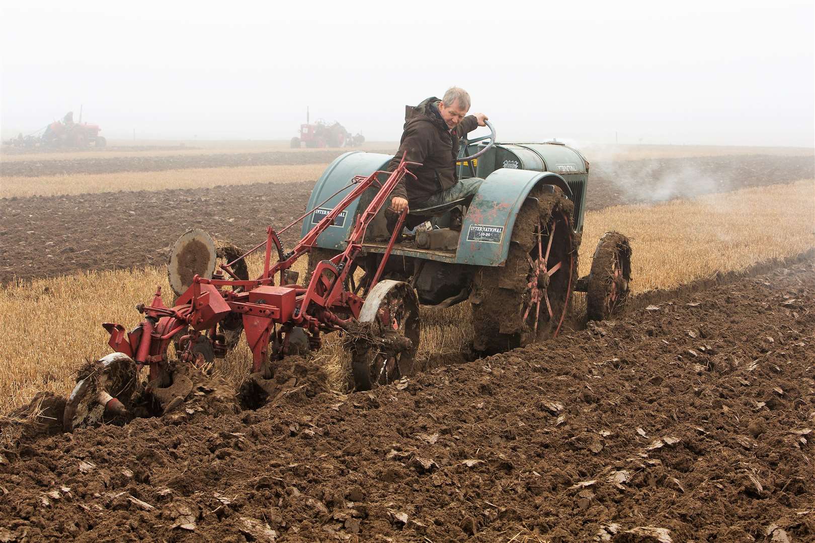 Michael Mackay, West Greenland, with his International tractor and plough combination, in the vintage trailing section. Michael was a winner at the event. Photo: Robert MacDonald/Northern Studios