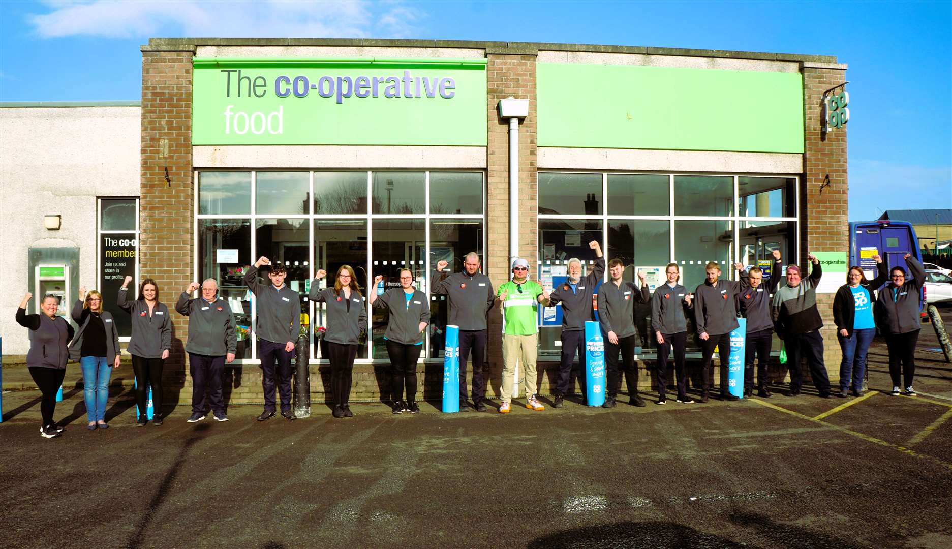 Modris Karklins at centre with his staff who gathered together outside the Wick Coop shop to wish him the best for his charity Sahara walk. Picture: DGS