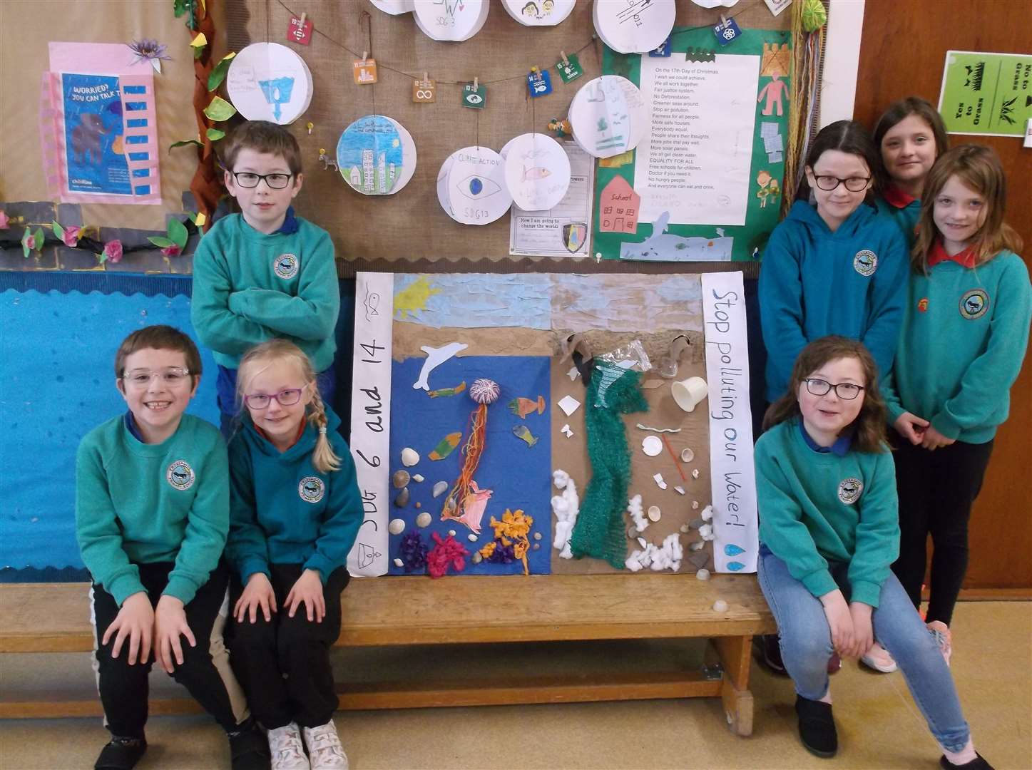 Crossroads Primary School pupils with their 'before and after' piece of artwork based on water pollution.