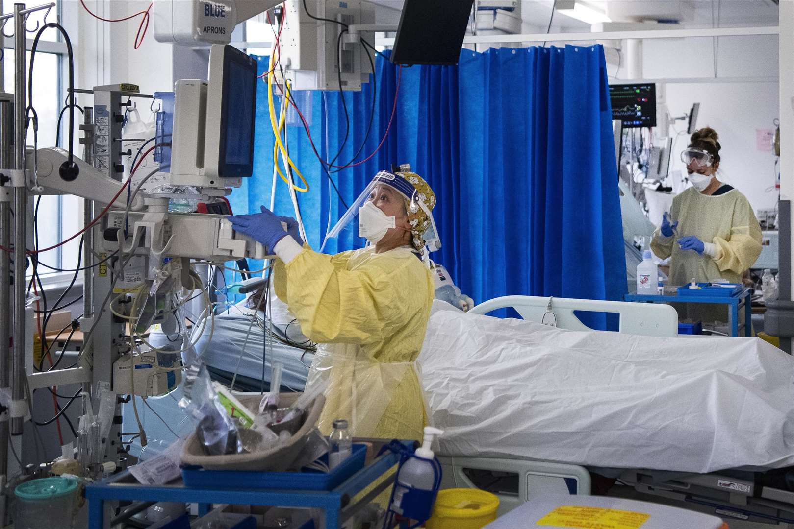Nurses work on patients in the ICU at St George’s Hospital in Tooting, south-west London (Victoria Jones/PA)