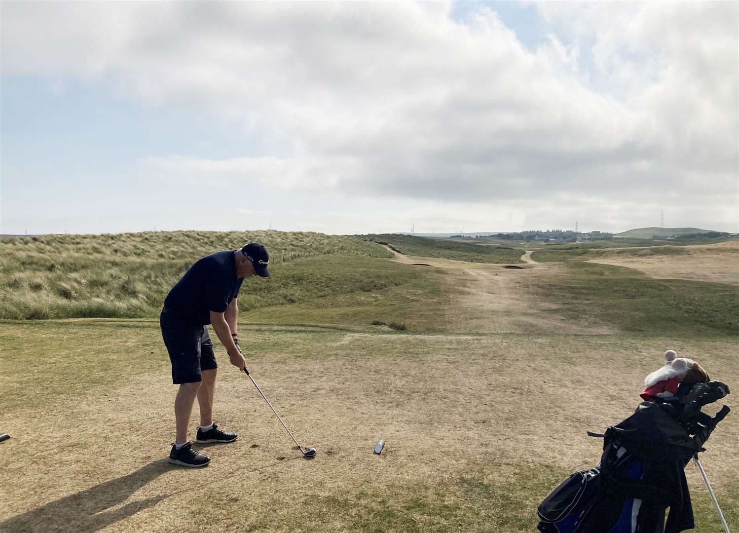 Steve Efemey teeing off at the fifth hole at Reay Golf Club.