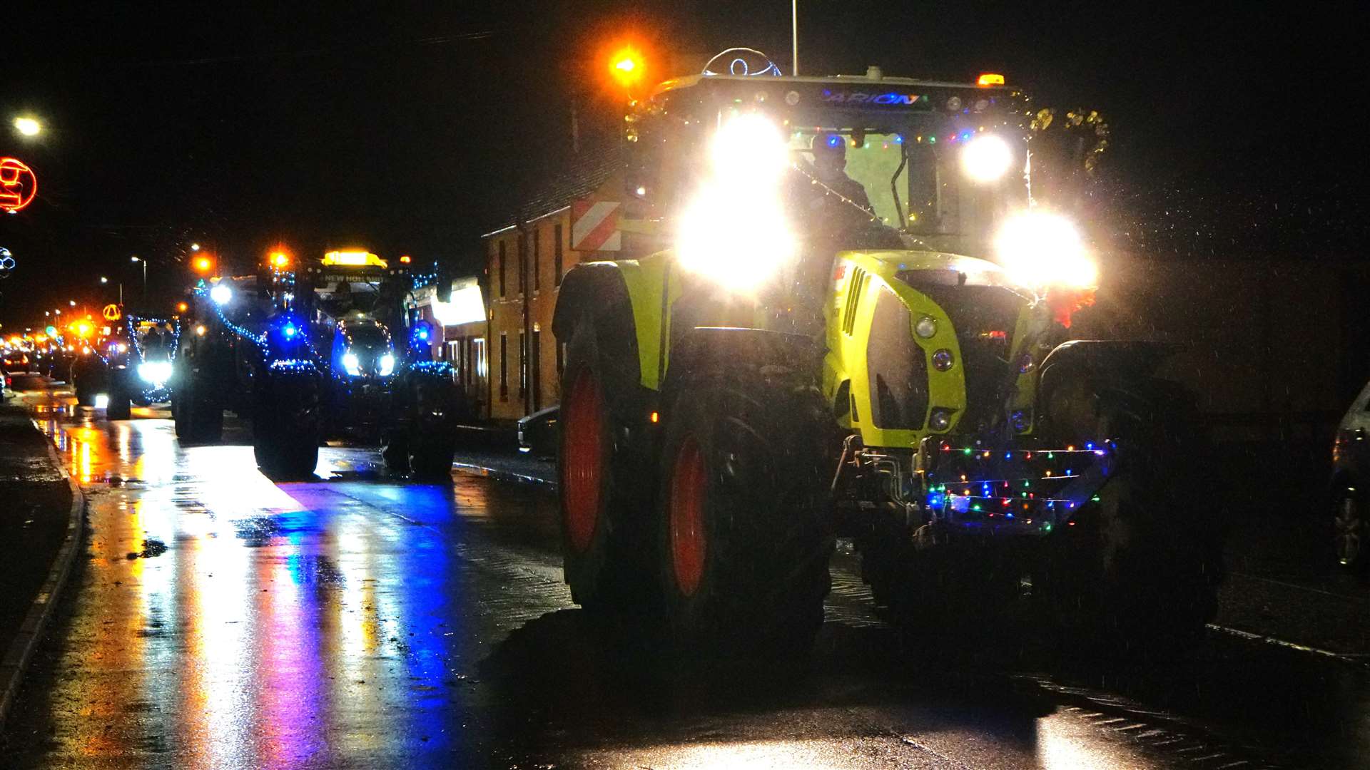 Young Farmers centenary tractor run travels through Watten on its way to Wick. Picture: DGS