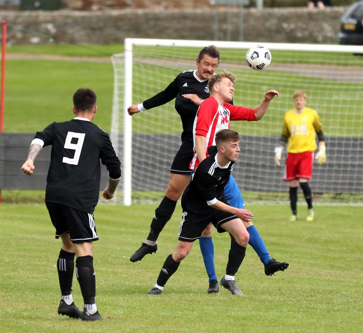 Thurso defender James McLean wins a header against Jamie Skinner of St Duthus during Saturday's draw at the Dammies. Picture: James Gunn