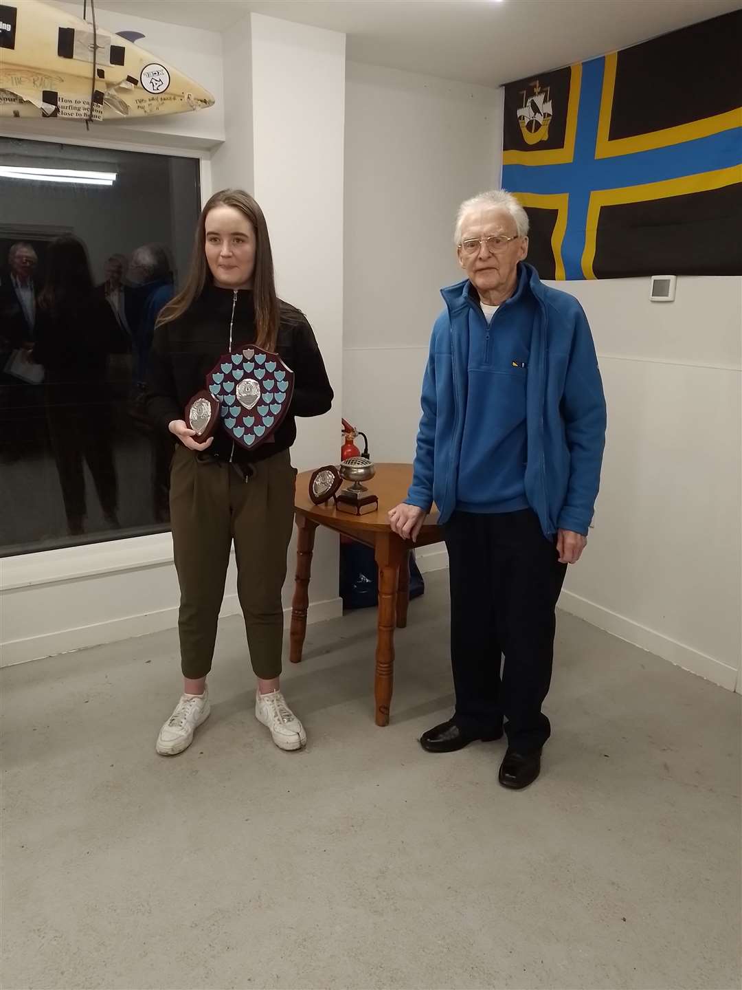Alisha Mackay is presented with the Caithness Junior Sportsperson of the Year award by Caithness Sports Council chairman Bill Robertson