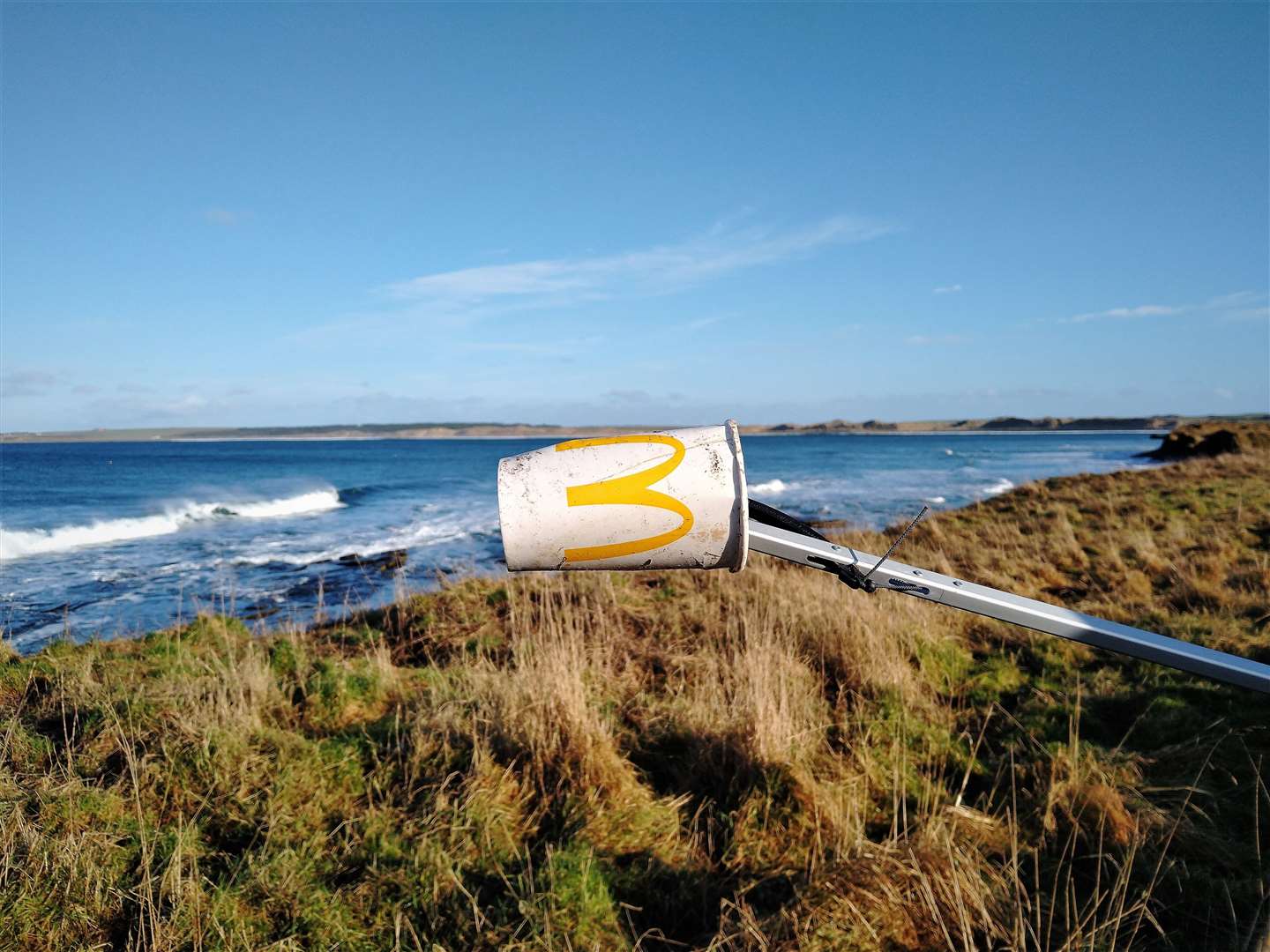 A cup from a McDonald's fast-food outlet was found at a beach near Castletown. The nearest McDonald's restaurant is over 100 miles away.