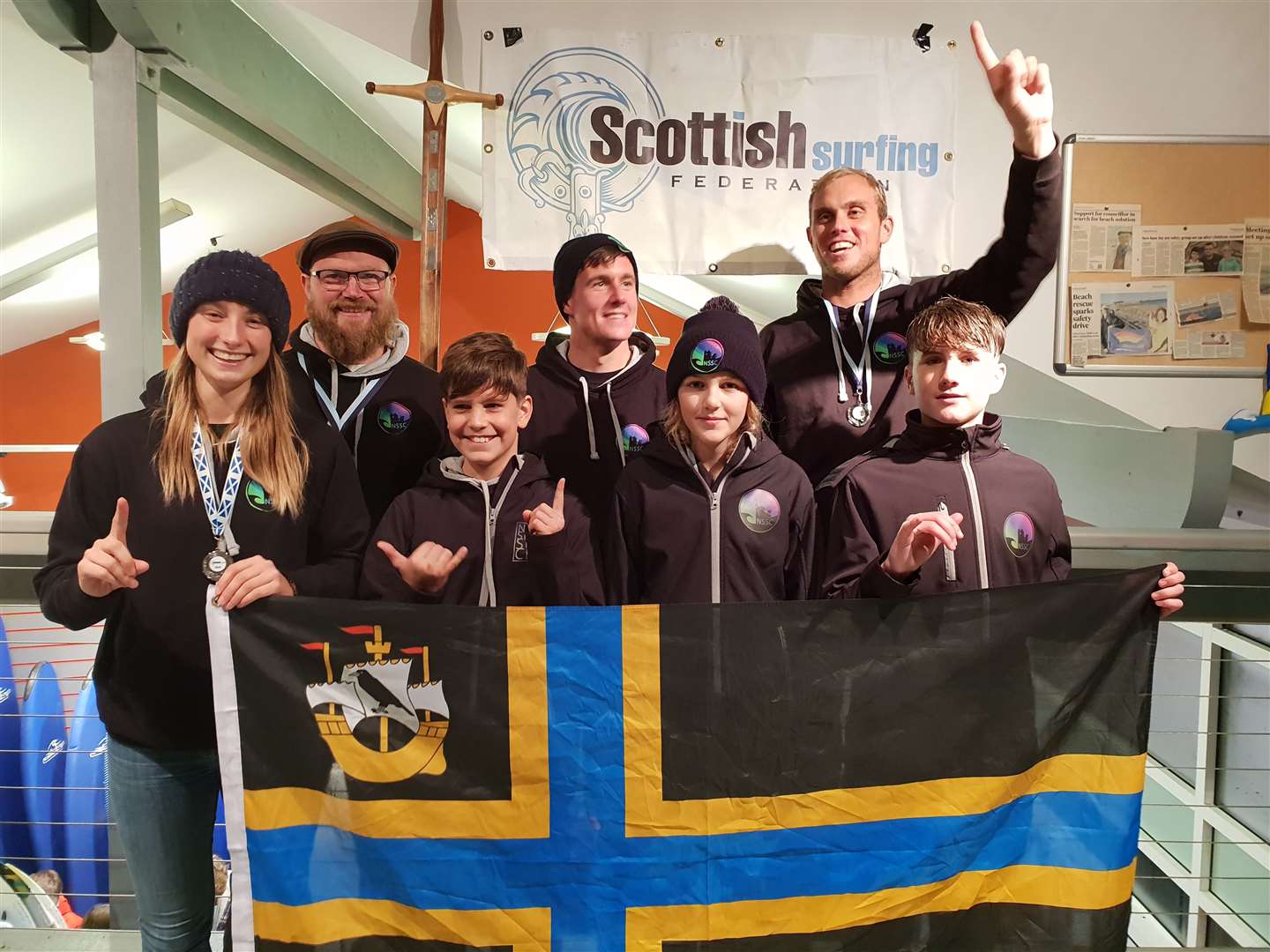 Thurso’s North Shore Surf Club with the clan sword for the fourth year running. From left: Phoebe Strachan, Chris Clarke, Ryan Henderson, Ritchie MacLean, Nadia Murray, Mark Boyd and Craig McLachlan. Picture: Lester Cruickshank