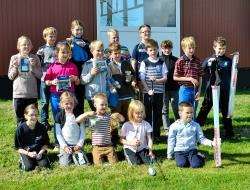 Prizewinners in the younger section of the junior open and right, victors in the tournament’s older section.