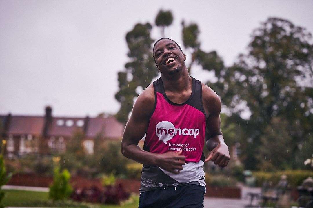 Aaron Plummer, 20, who has cerebral palsy and a learning disability, completed the race in Walthamstow, London (Mencap/PA)