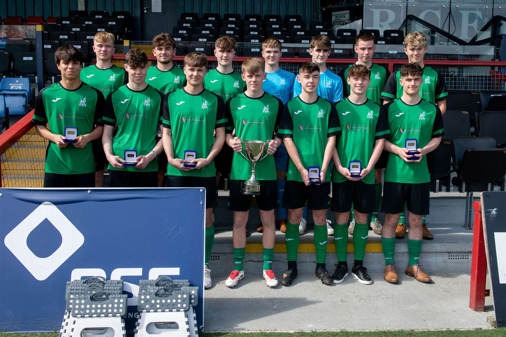Members of the North senior boys’ team were presented with the Scottish National Trophy at Ross County’s stadium. Picture: Callum Mackay