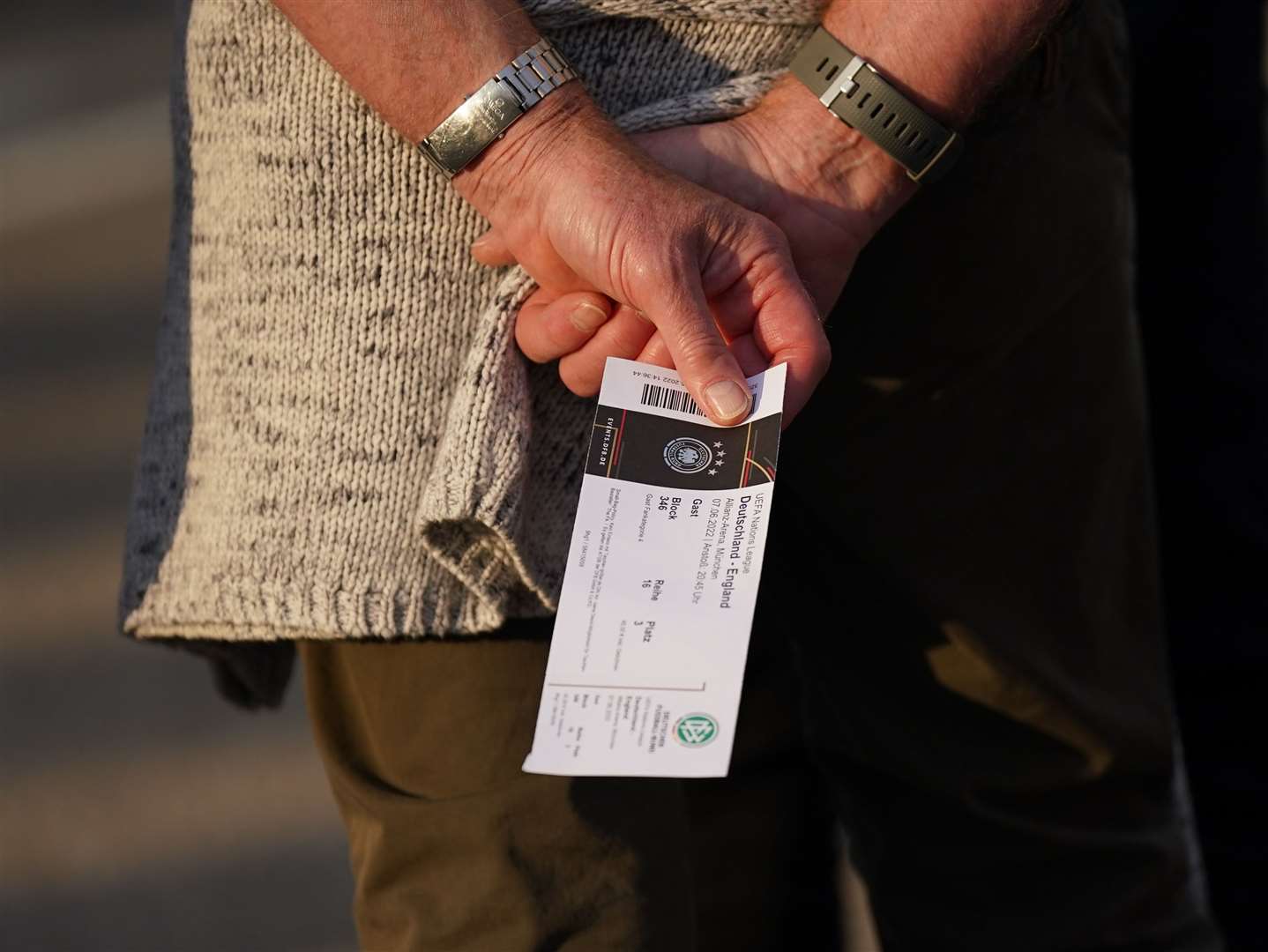 An England fan holds a ticket at the Allianz Arena in Munich (Yui Mok/PA)