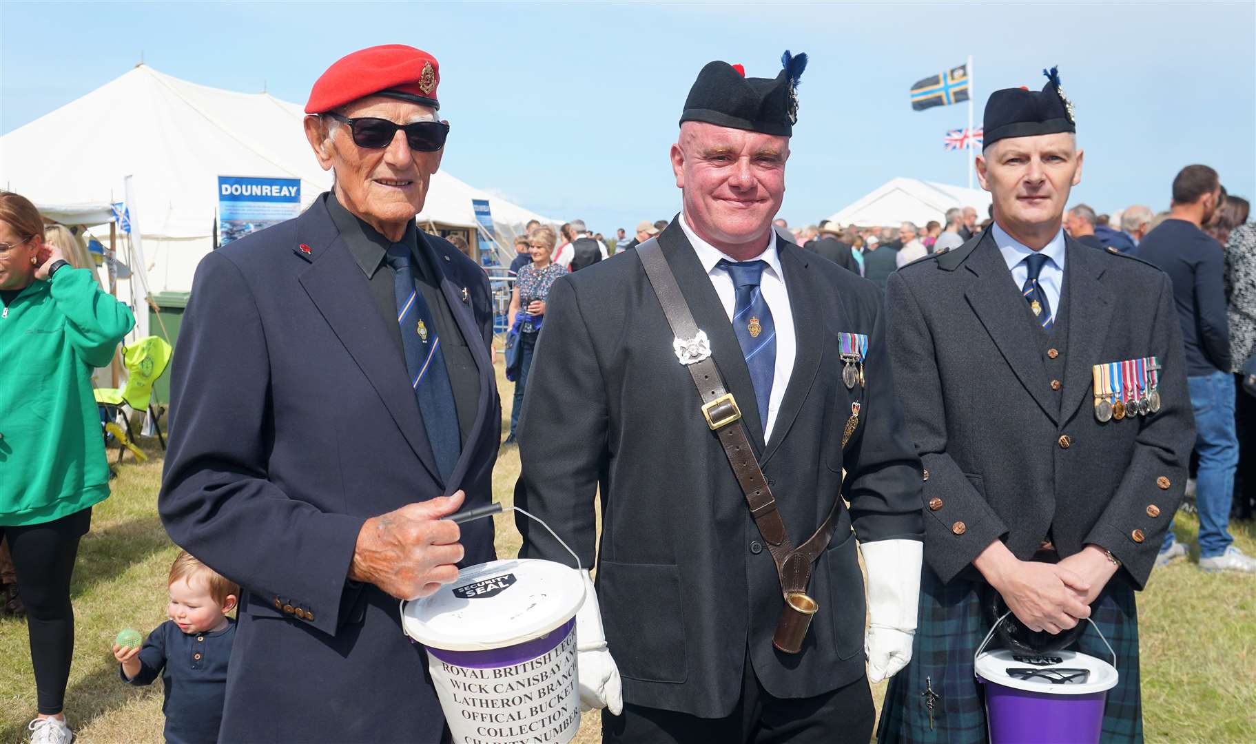 From left, Denny Swanson, Kev Stewart and Angus Mackay. Kev is a new standard bearer after Charlie Williamson passed away last year and joined Alex Paterson on the day. Picture: DGS