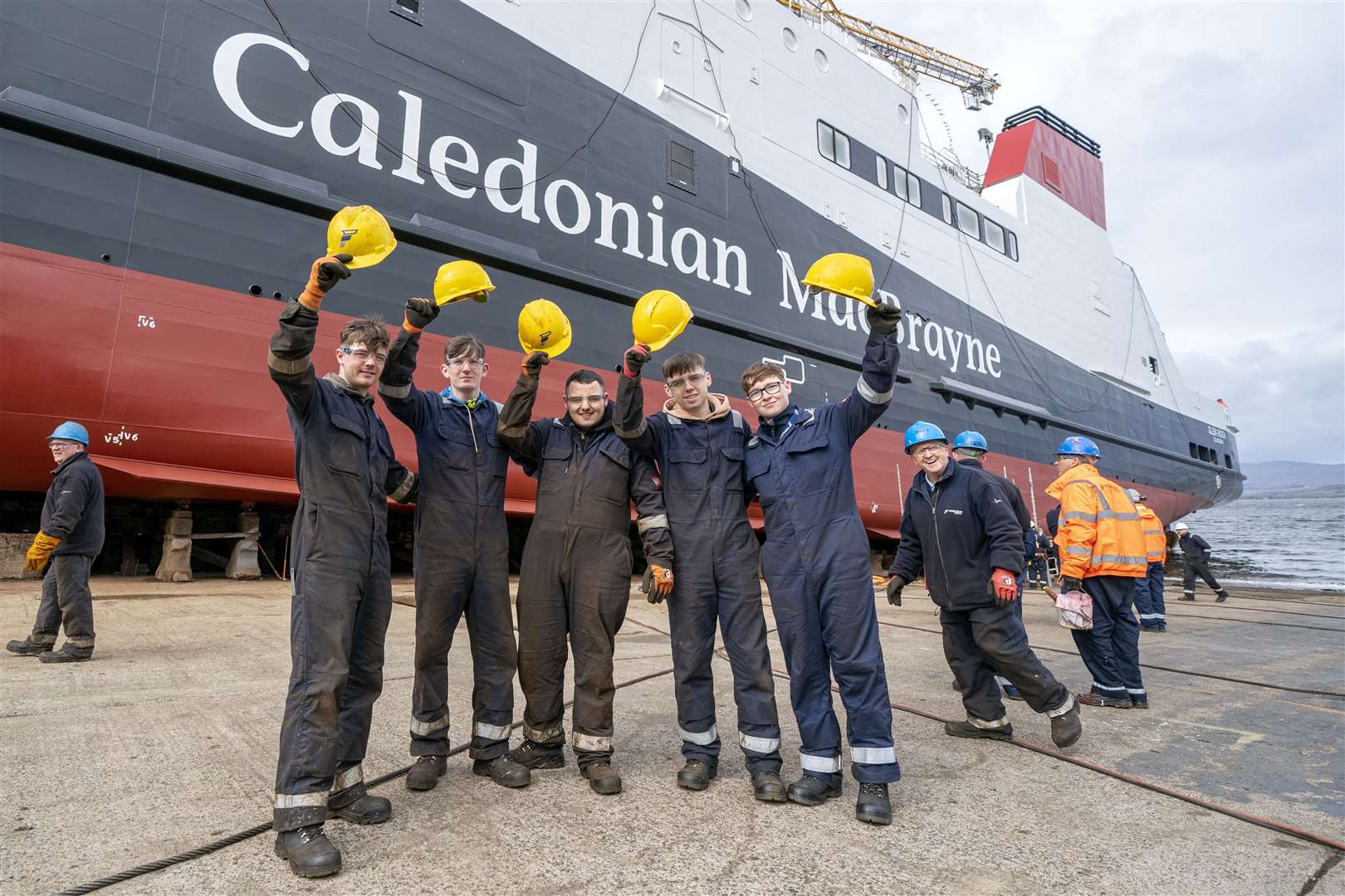 Apprentice shipbuilders gathered alongside the MV Glen Rosa before the launch (Jane Barlow/PA)