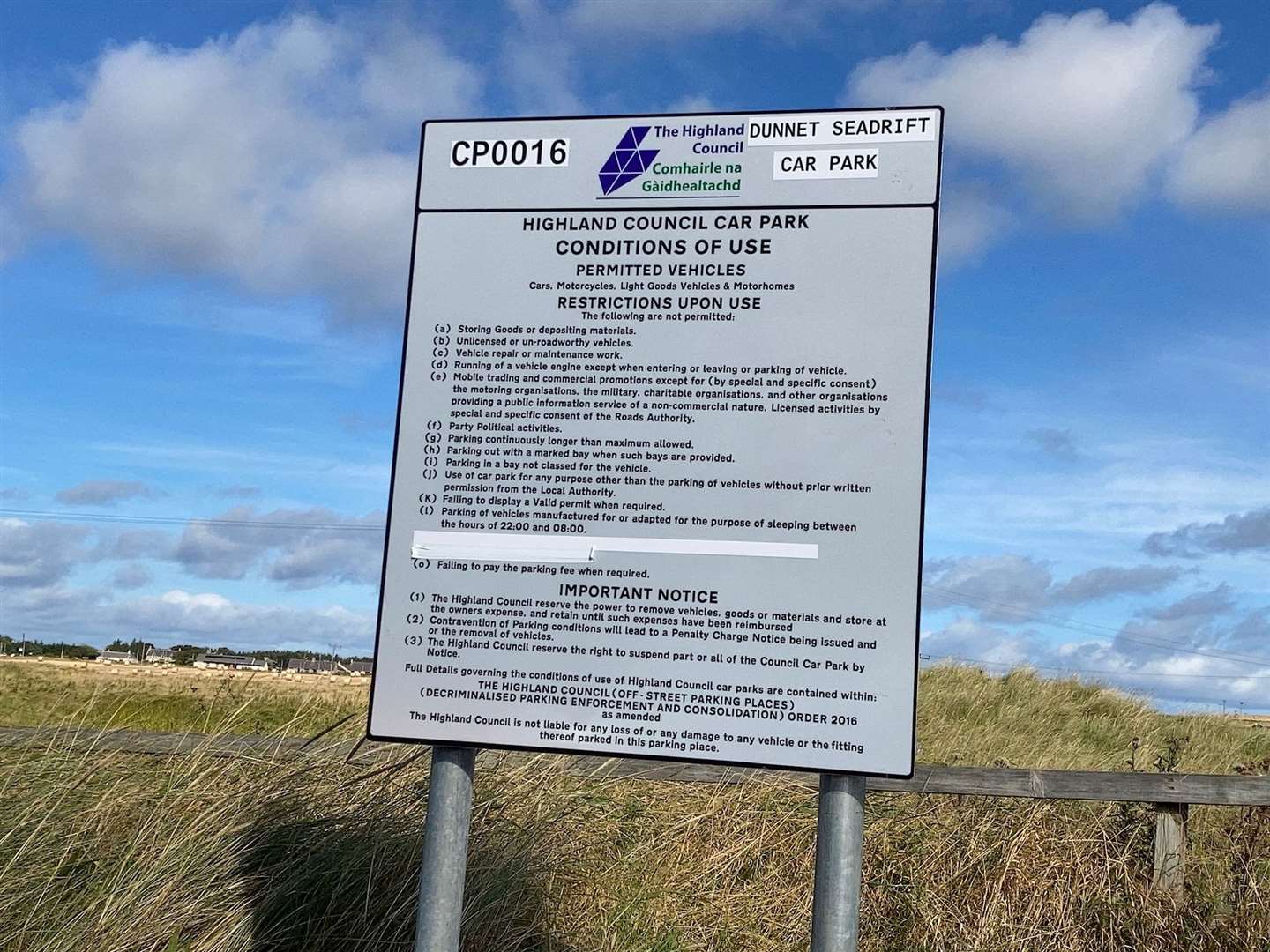 The control of use sign at Dunnet beach which was put up around August 10 by the Highland Council's parking services to allow enforcement of misuse of the car park. This picture shows the taped off trailer restriction, altered on August 25.