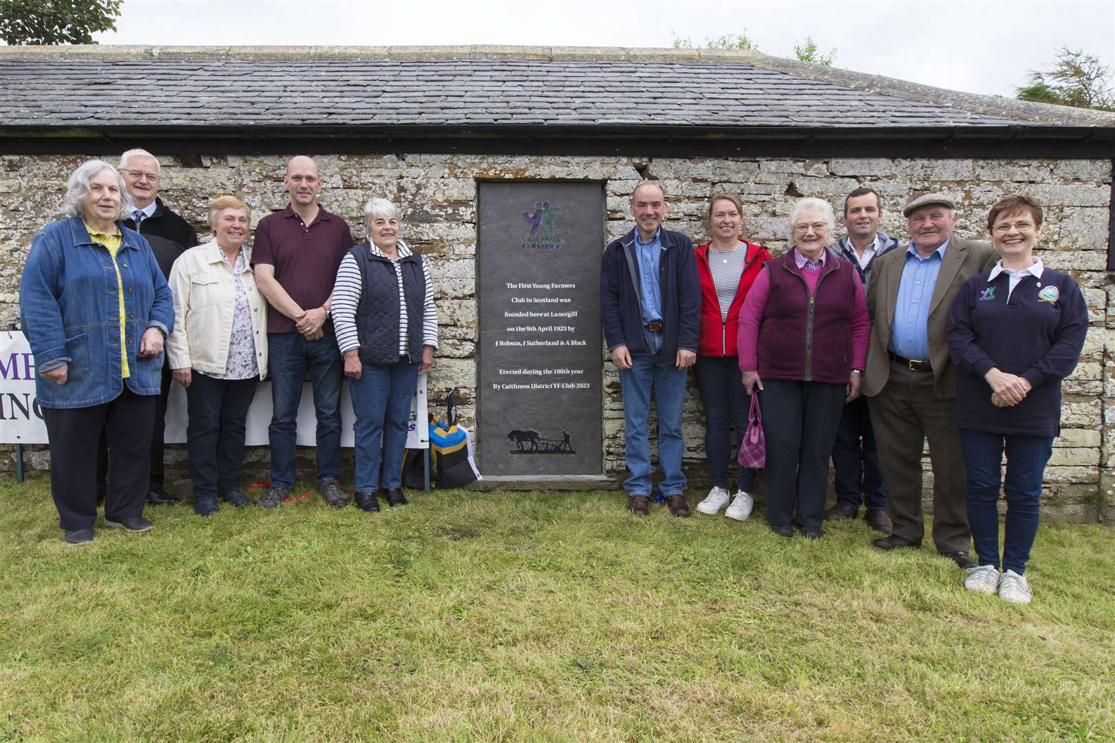 Although the Young Farmers movement came into being in Watten district in 1923, the Watten club folded around 10 years ago due to a lack of members. Some of the past members are pictured along with the commemorative stone. Picture: Robert MacDonald / Northern Studios