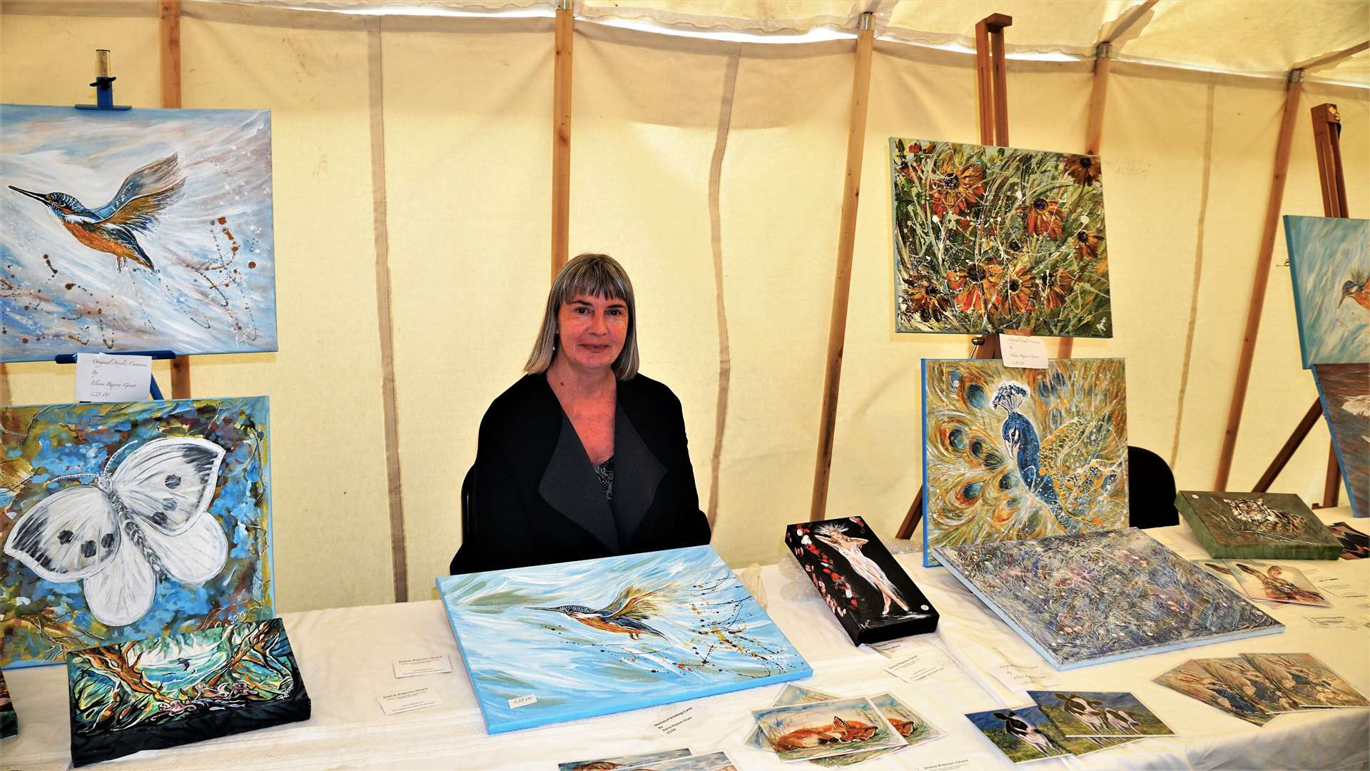 Elaine Rapson-Grant with some of her art at a vintage car rally in John O'Groats two years ago. Picture: DGS