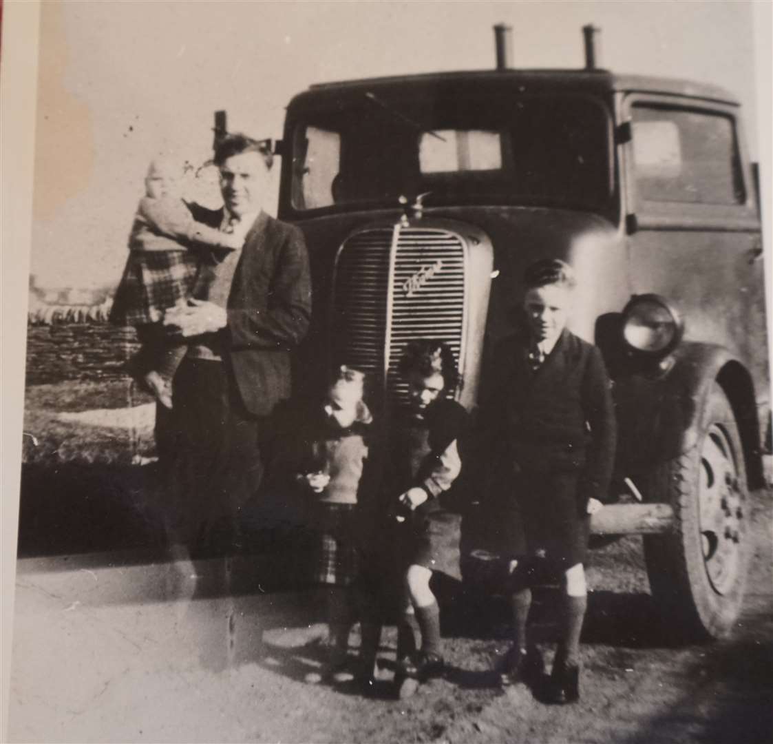 Ian showed a picture of his dad, Clair Fraser, and believes he is one of the children with him.