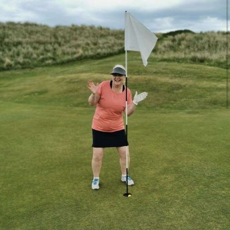 Pauline Craig celebrating her hole in one at the fifth at Reay Golf Club.