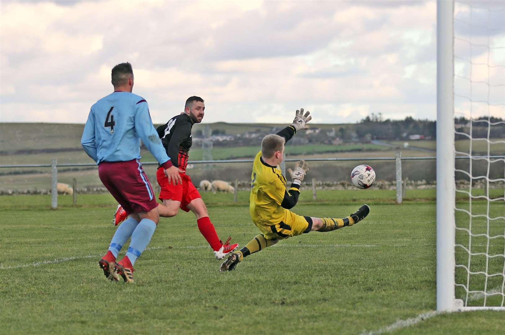 Halkirk United's Bobby Gunn fires past Bunillidh goalkeeper Cameron Yuill to score his second goal and United's fourth in Halkirk's 6-0 victory. Picture: James Gunn