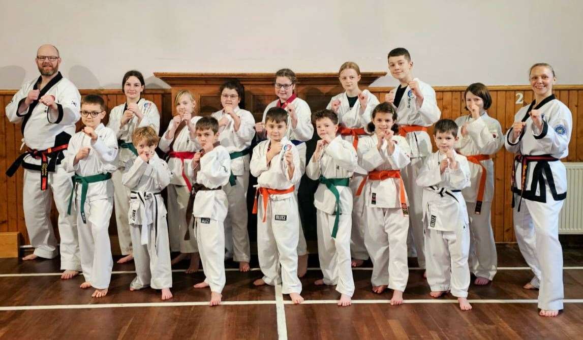 All the students who successfully graded at the weekend showing off their new belts, with club instructor Master Stephen Mezals (4th Dan) and the head of Scotland Tang Soo, Master Kelly Murphy (7th Dan). Back (from left): Master Stephen Mezals, Rebecca Henyel, Mia MacGregor, Kayleigh MacDonald, Robyn Speirs, Katie Carney, Alex Flett, Mairead McIntosh, Master Kelly Murphy. Front: Owen Munro, Alfie MacGregor, Kieran Wilson, Harvey Cargan, Logan Barnett, Amalie Rowe and Scott Henderson.