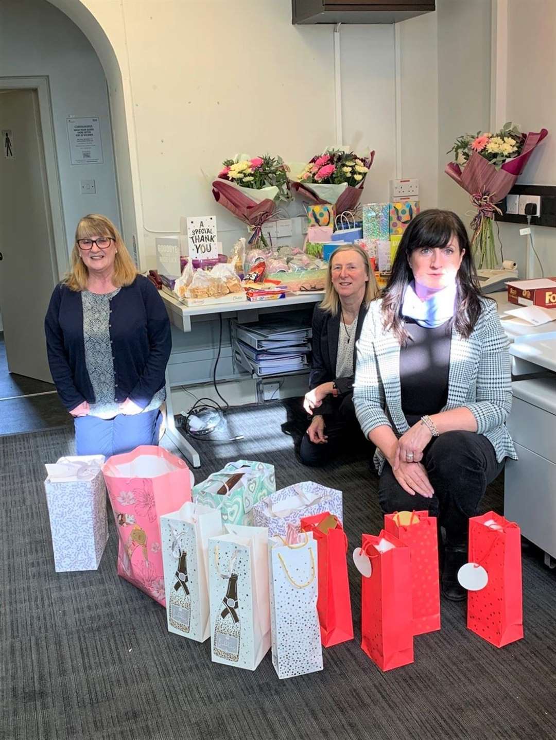 Wick TSB staff pictured with some of the many gifts they got from customers. Pictured from left are Anne Mackay, Maureen Coghill and Jennifer Darroch.