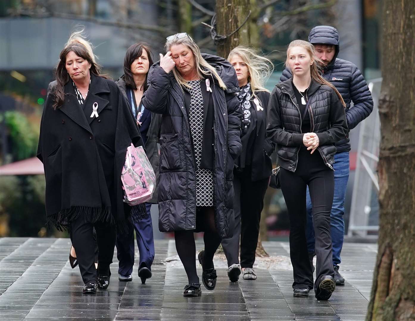 Cheryl Korbel (centre) mother of nine-year-old Olivia Pratt-Korbel, arrives with family members at Manchester Crown Court for the trial of Thomas Cashman (Peter Byrne)