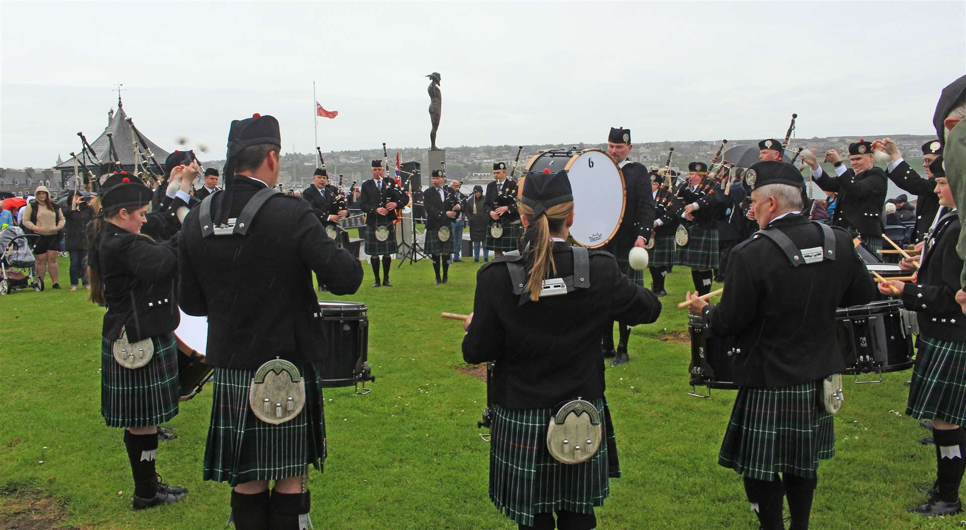Wick RBLS Pipe Band welcoming members of the public to the Braehead ceremony. Picture: Alan Hendry