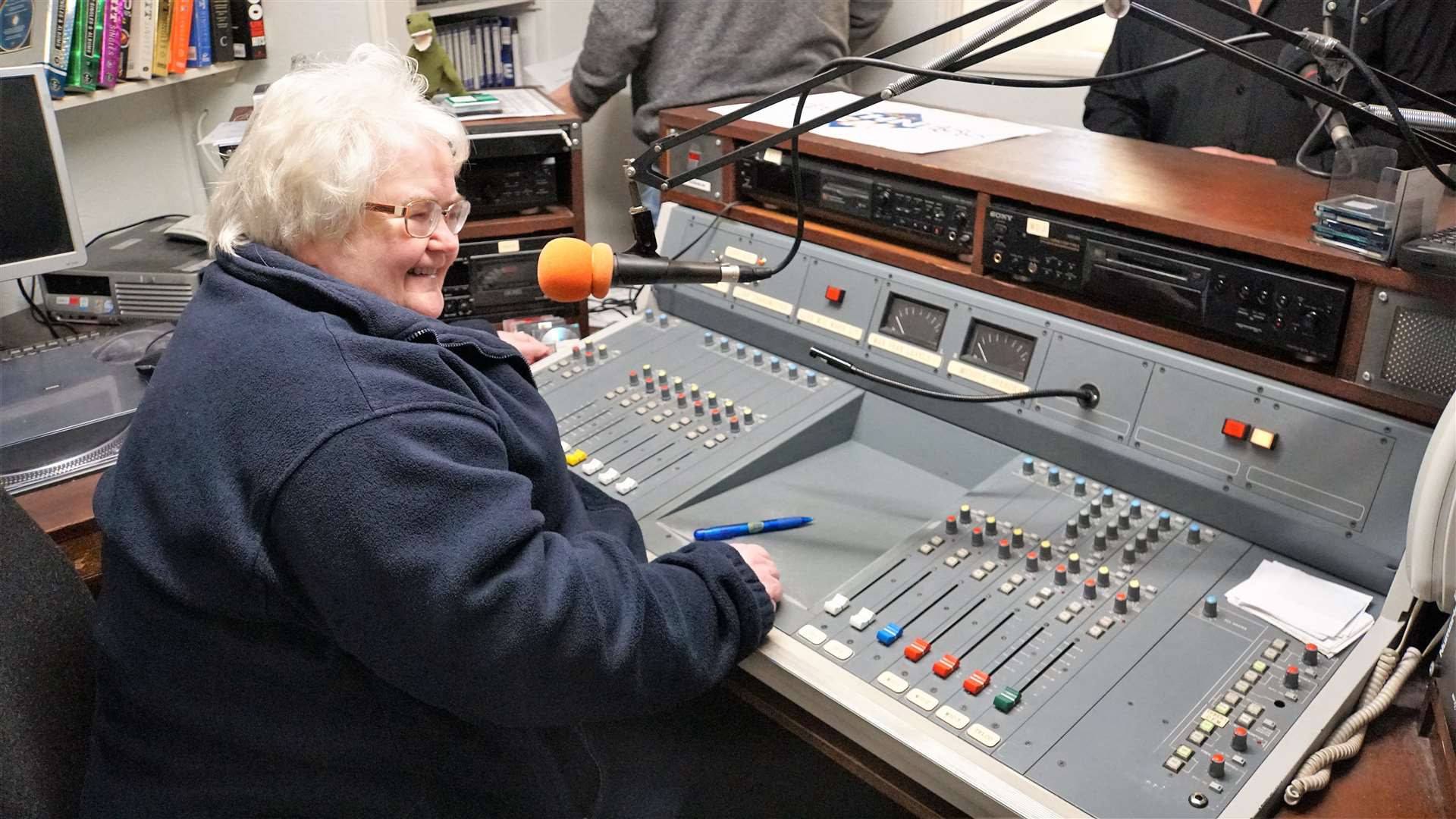 Jackie Johnson, company secretary of the radio station, gets ready to go on air. Pictures: DGS