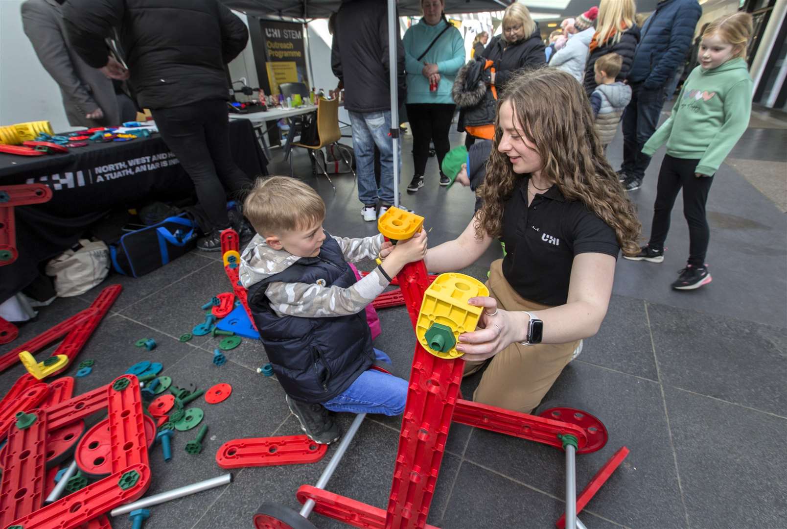 Mara Gibb from UHI's STEM at Thurso helps Matthew Miller, Wick, build a model. Photo: Robert MacDonald/Northern Studios