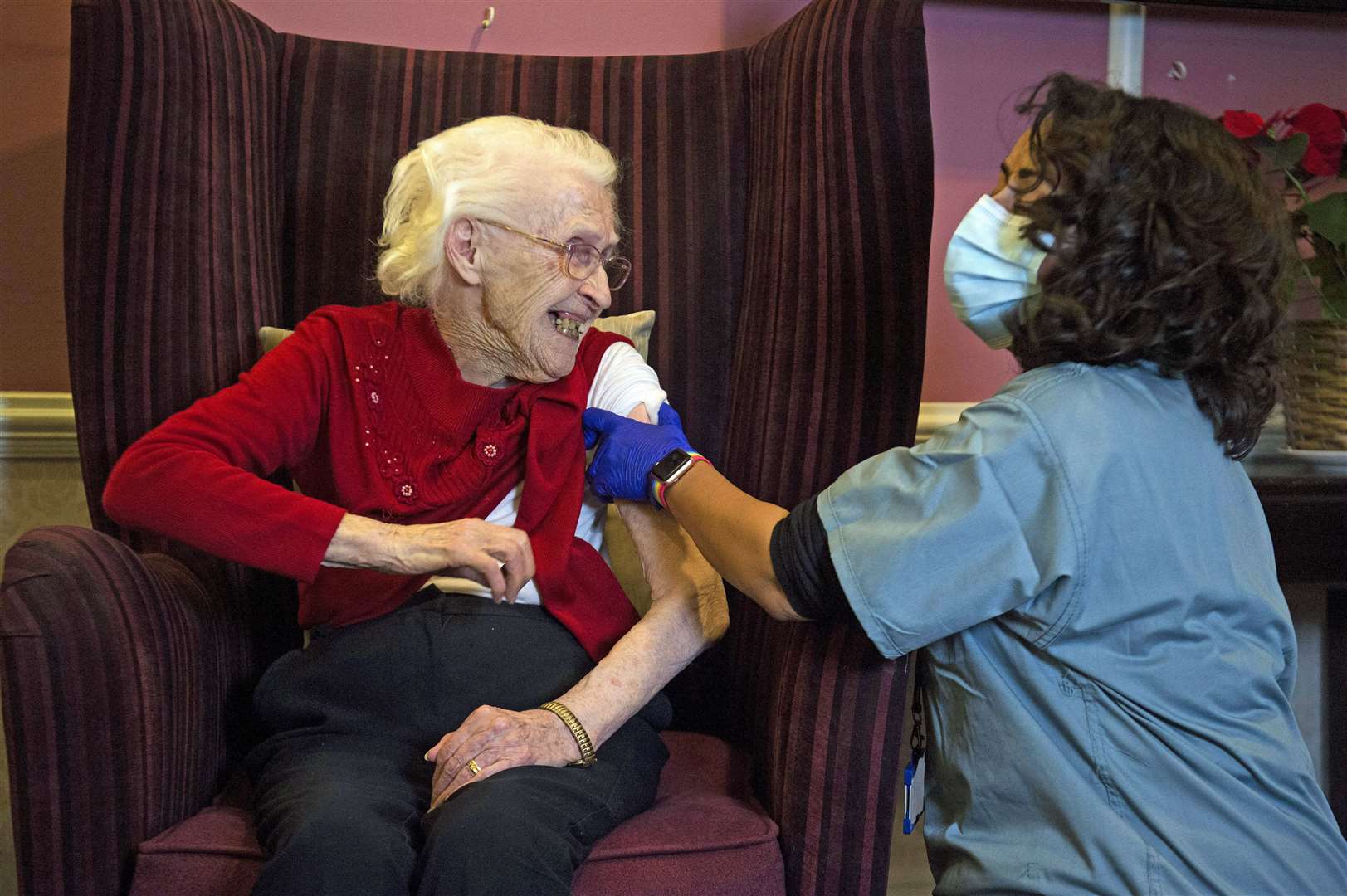 Ellen Prosser, 100, known as Nell, receives the vaccine at a care home in Sidcup as the Government continues to ramp up the vaccination programme (Kirsty O’Connor/PA)