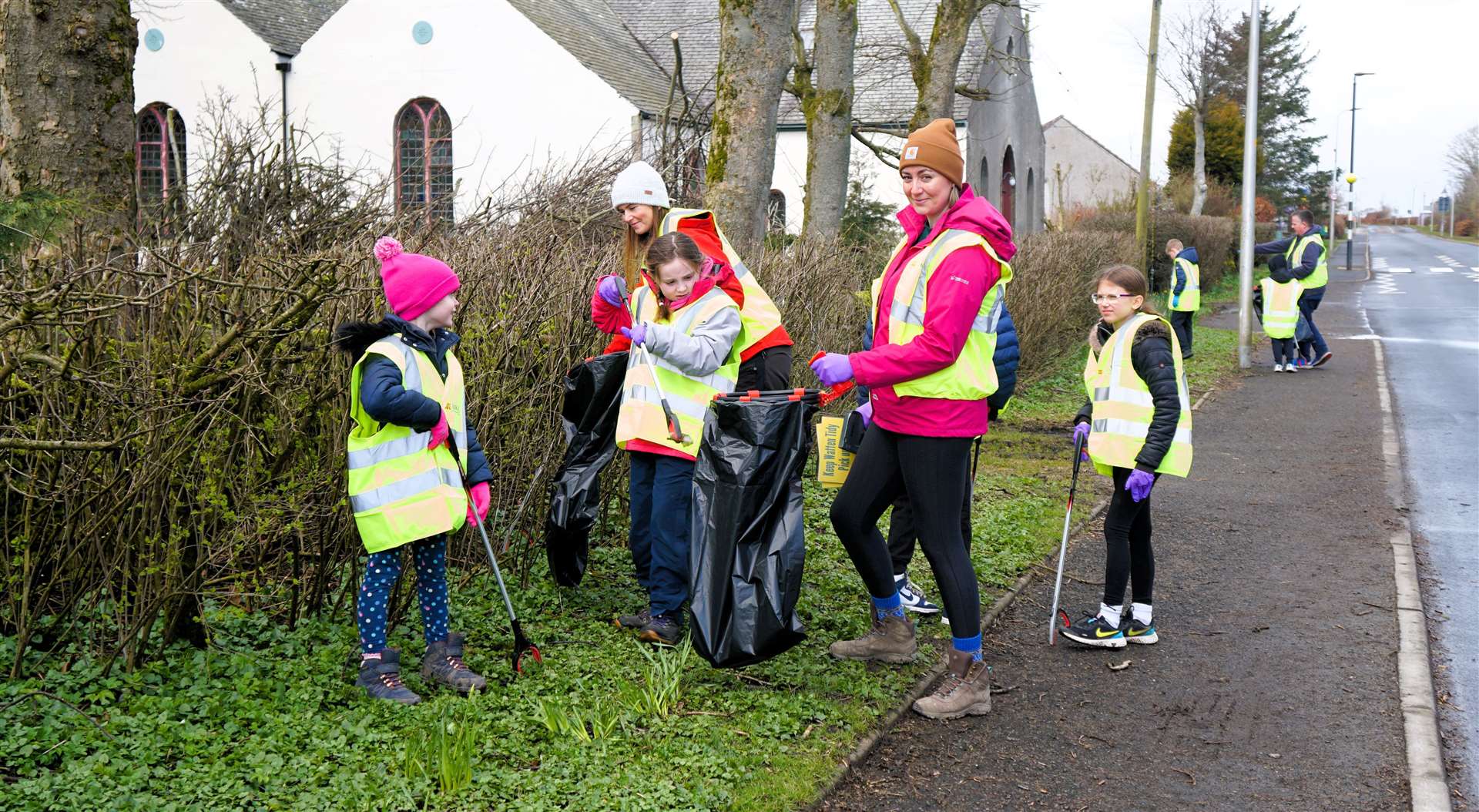 Some of the volunteers clearing rubbish up from the centre of Watten on Sunday morning. Picture: DGS