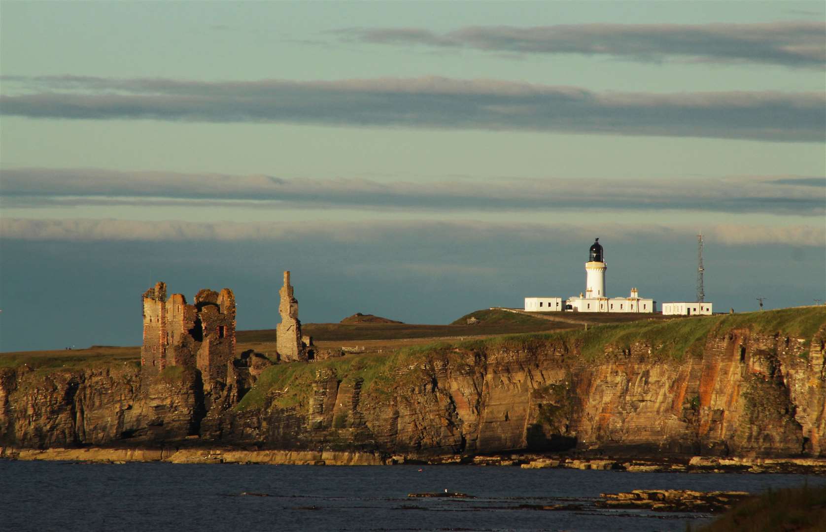 Castle Sinclair Girnigoe and Noss Head lighthouse.