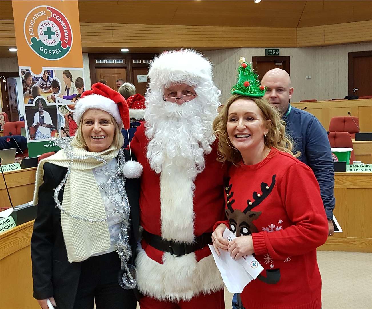 Caithness civic leader Willie Mackay, as Santa, is joined by Highland councillor and Inverness provost Helen Carmichael (left) and choir organiser Fiona Robertson from Tain.