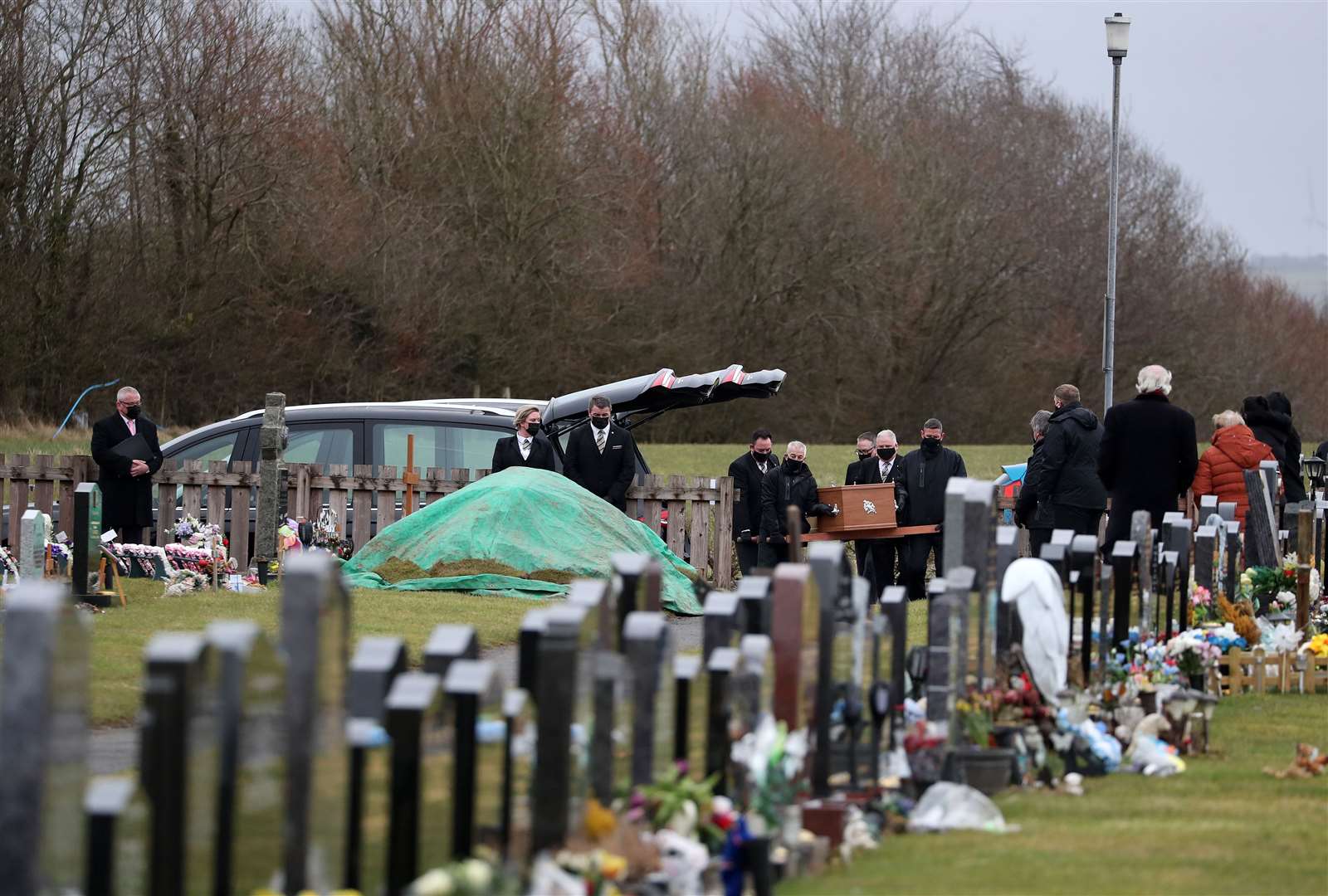 The coffin of Nicole Anderson is carried to the graveside (Andrew Milligan/PA)