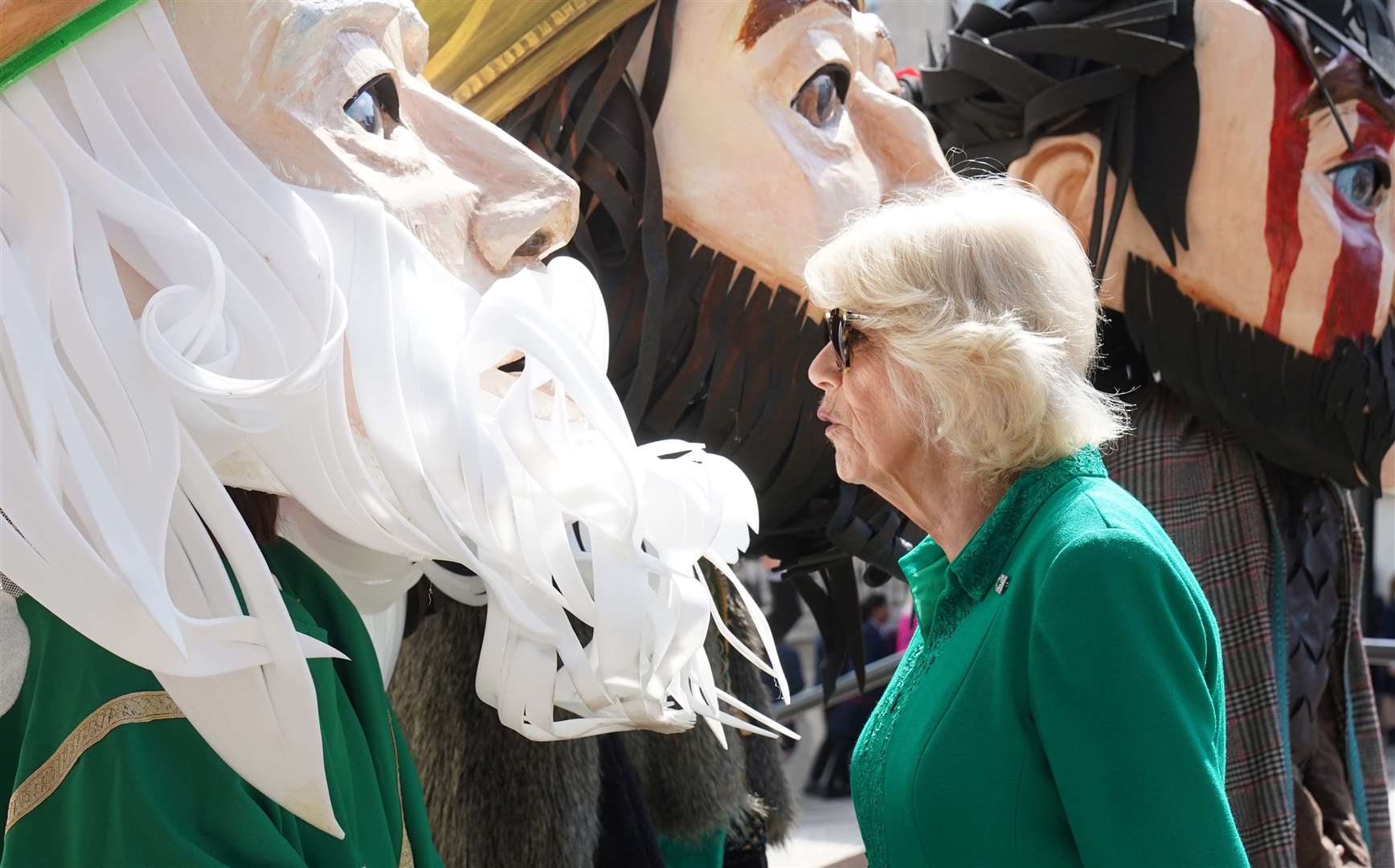 The Queen meets characters representing legendary and historical characters associated with Armagh during a visit to Market Theatre Square, Armagh (Brian Lawless/PA)
