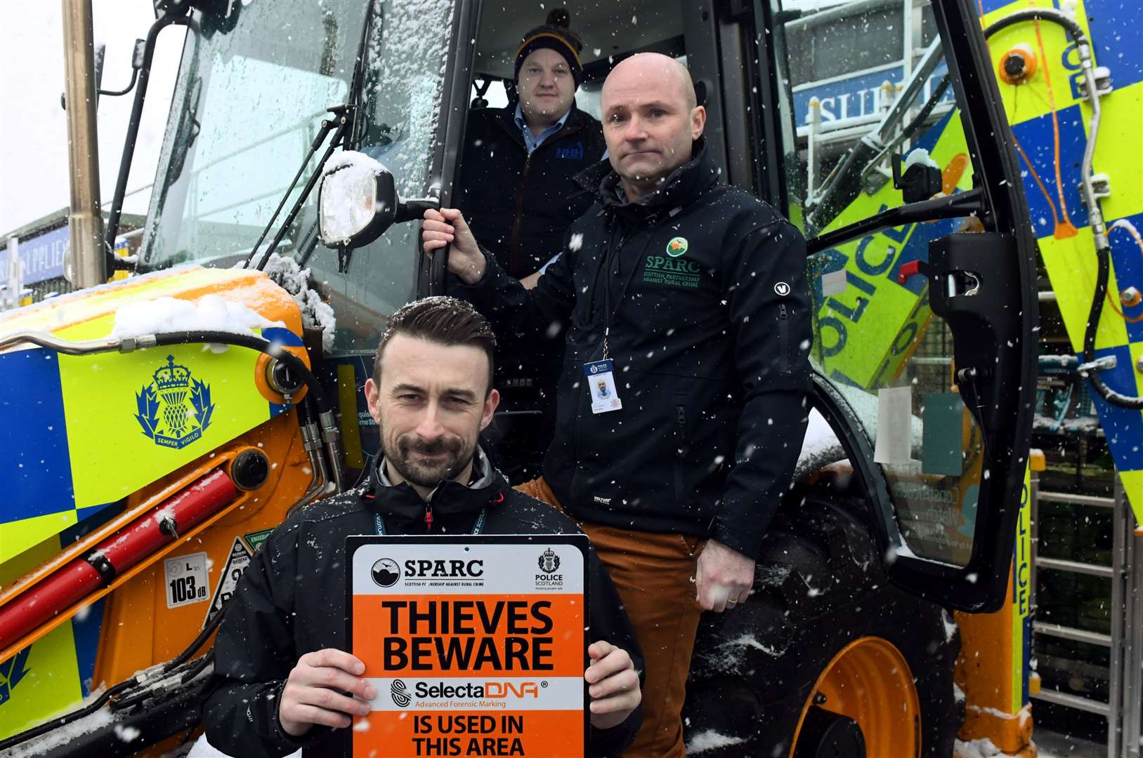 PC Kevin Taylor, Callum Mackintosh, of the Scottish Plant Owner Association and PC Jamie Stewart provide advice at the event in Inverness. Picture: James Mackenzie.