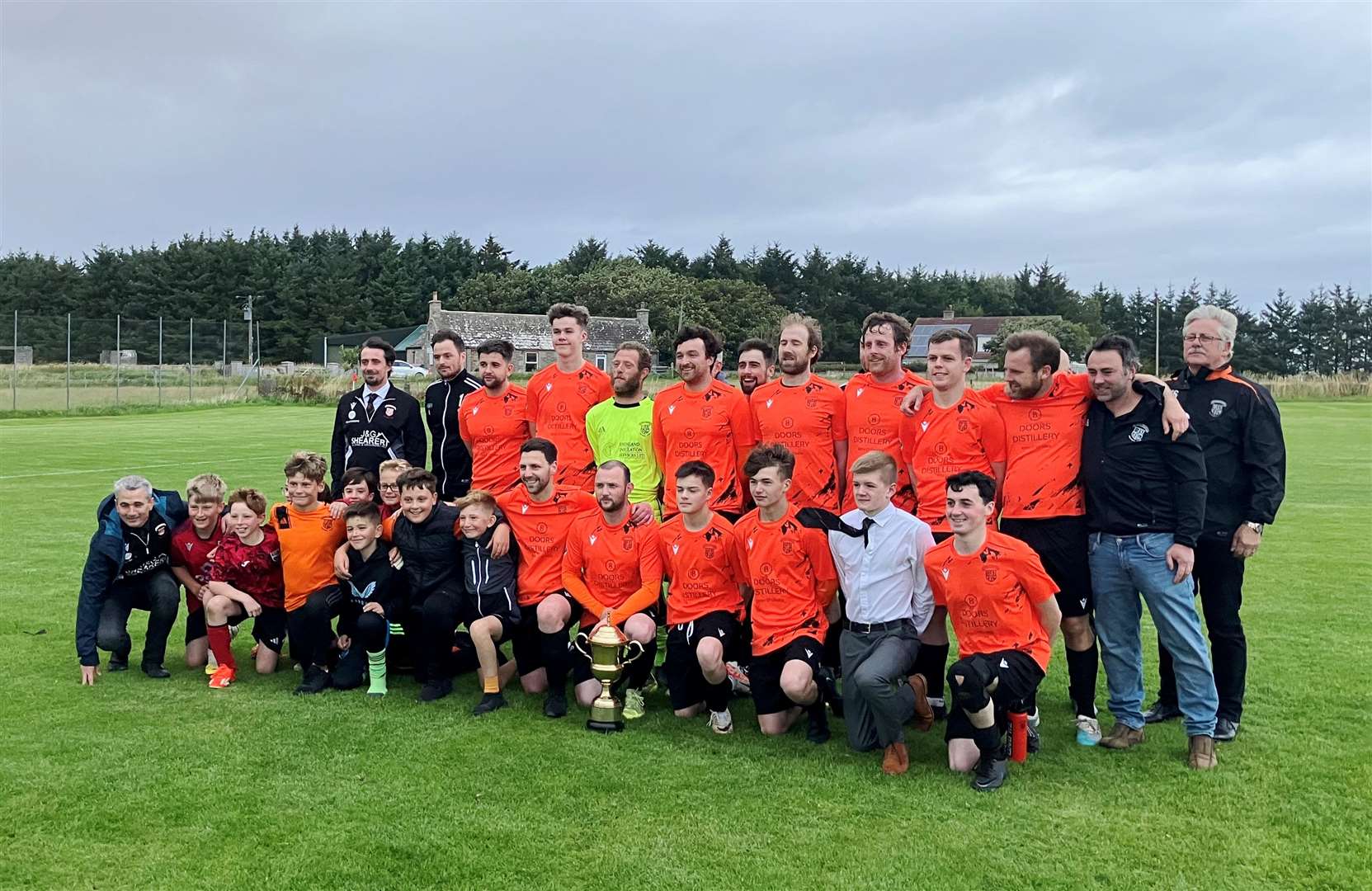 John O’Groats with the play-off trophy after their 4-0 victory over Swifts in Dunnet on Friday night. Picture: Andrew Mowat