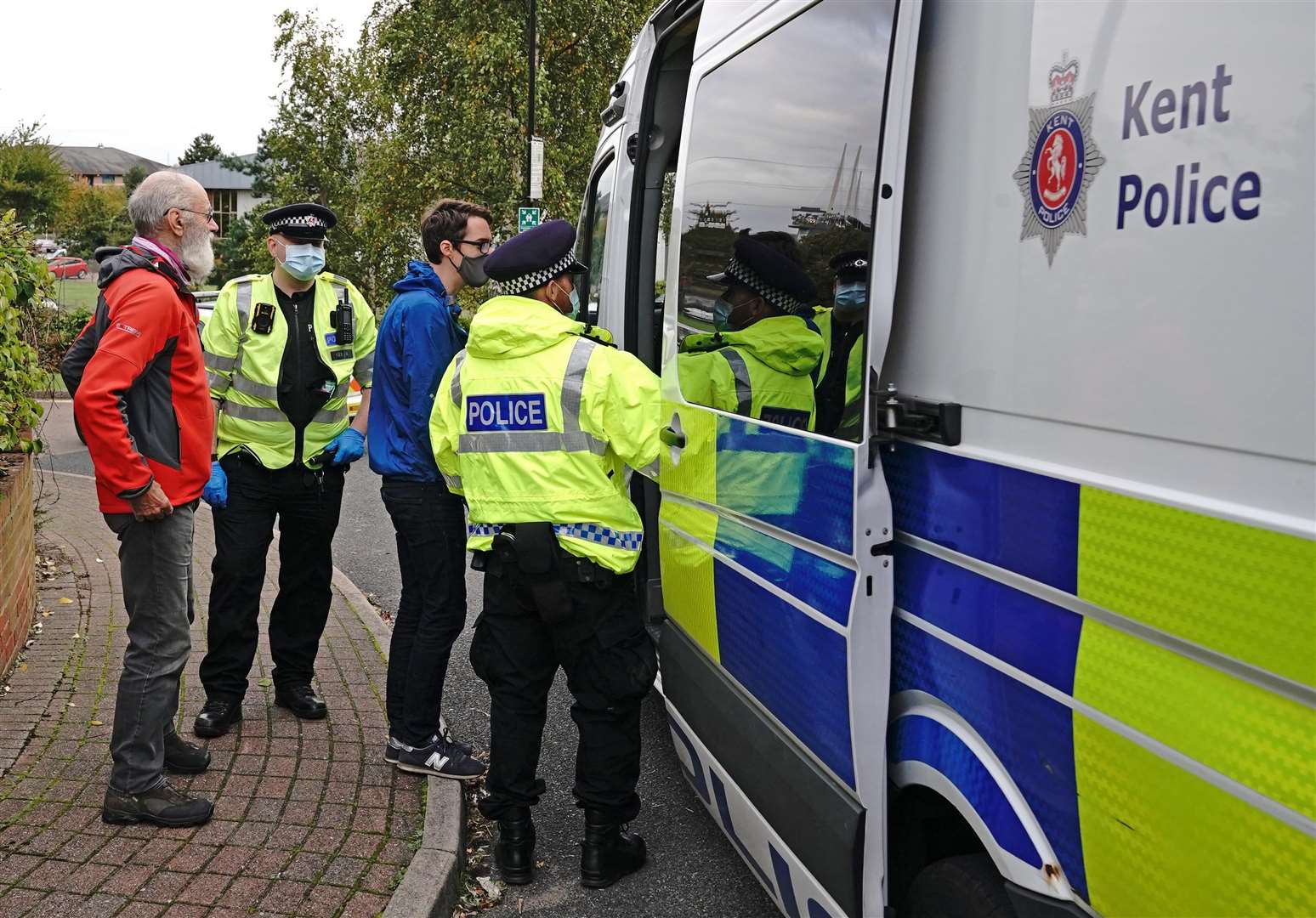 Protesters from Insulate Britain including Tony Hill (left) are arrested by police in the car park of the DoubleTree by Hilton Hotel Dartford Bridge in Dartford (Jonathan Brady/PA)