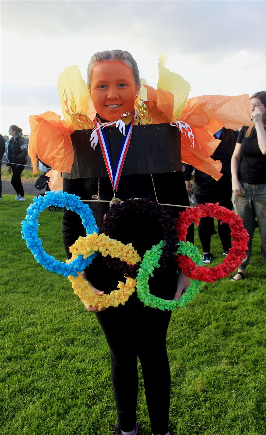 Ella Miller (10) set the event alight by dressing up as the 2024 Olympic torch. Picture: Alan Hendry