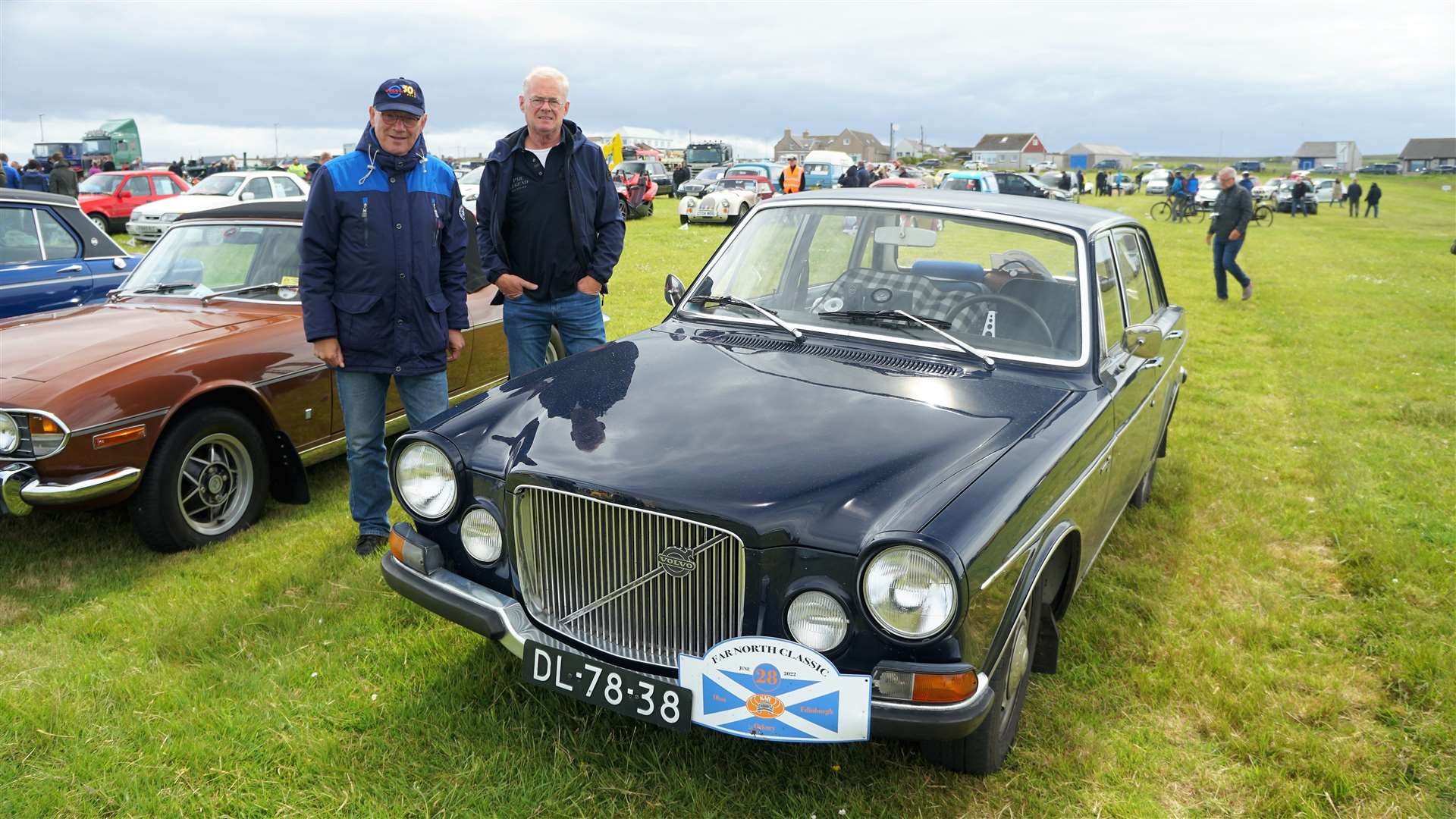 Car owner Kees van Dorth, left, and friend Jan were touring the Highlands when they came across the rally by chance. Their classic six-cyclinder Volvo dates from 1969 and had come all the way from Amsterdam. Picture: DGS