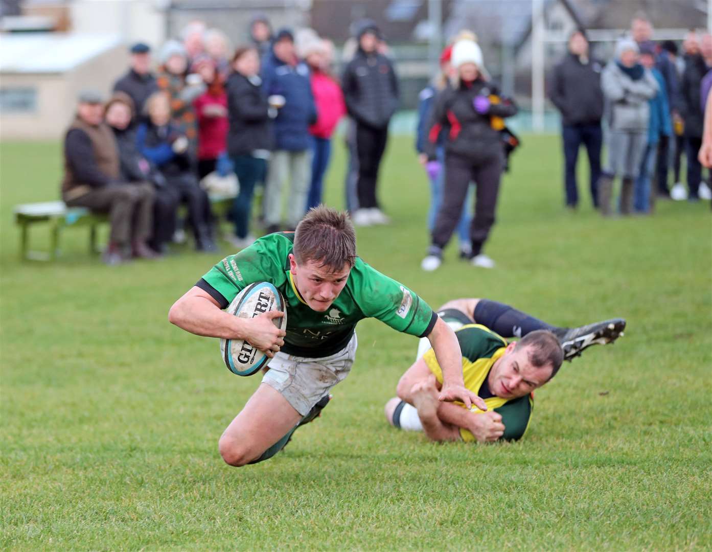 Scott Webster scoring a try for Caithness in the Boxing Day fixture two years ago. Picture: James Gunn