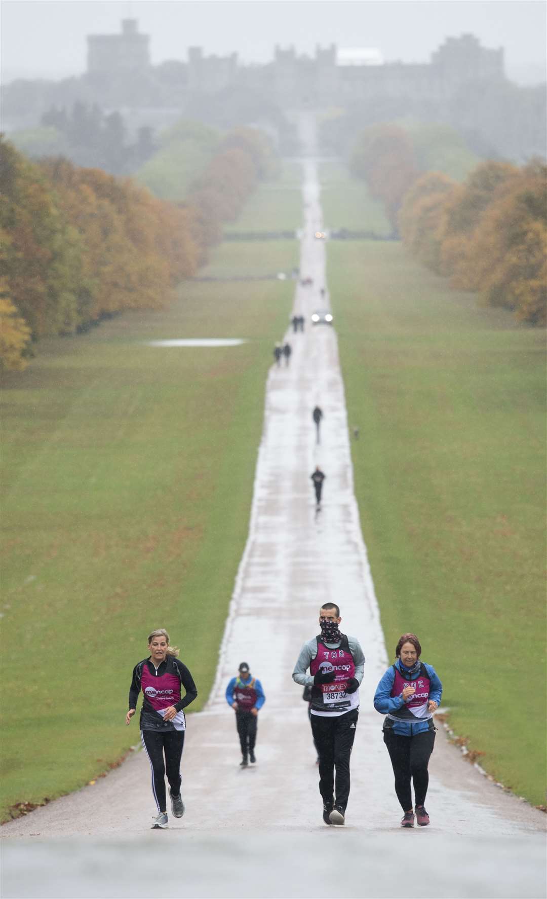 Sophie the Countess of Wessex (left) joined Tomas Cardillo-Zallo, a member of Mencap’s learning disability running team and his mother Sue, acting as his guide runner, for the first 1.5 miles of their virtual London Marathon on the Long Walk in Windsor (David Rose/The Daily Telegraph/PA Wire).