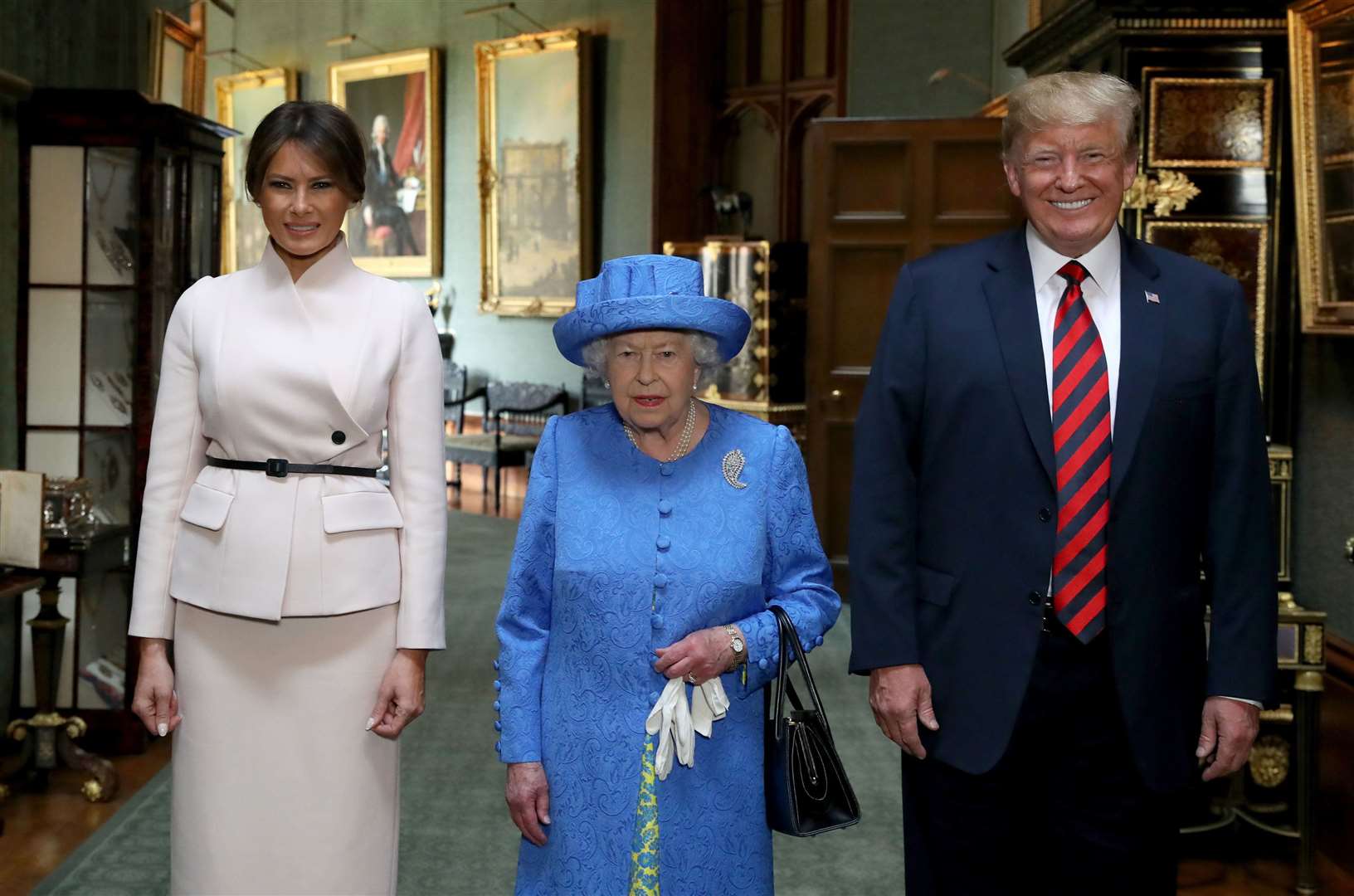 The Queen with then US president Donald Trump and his wife Melania at Windsor in 2018 (Steve Parsons/PA)