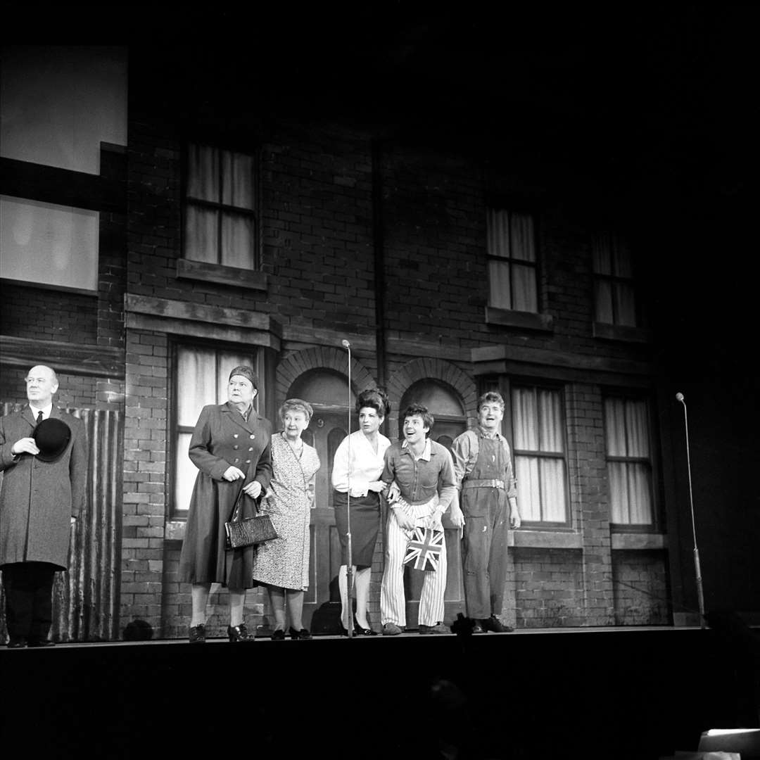 Philip Lowrie on stage, pictured second from right (PA)