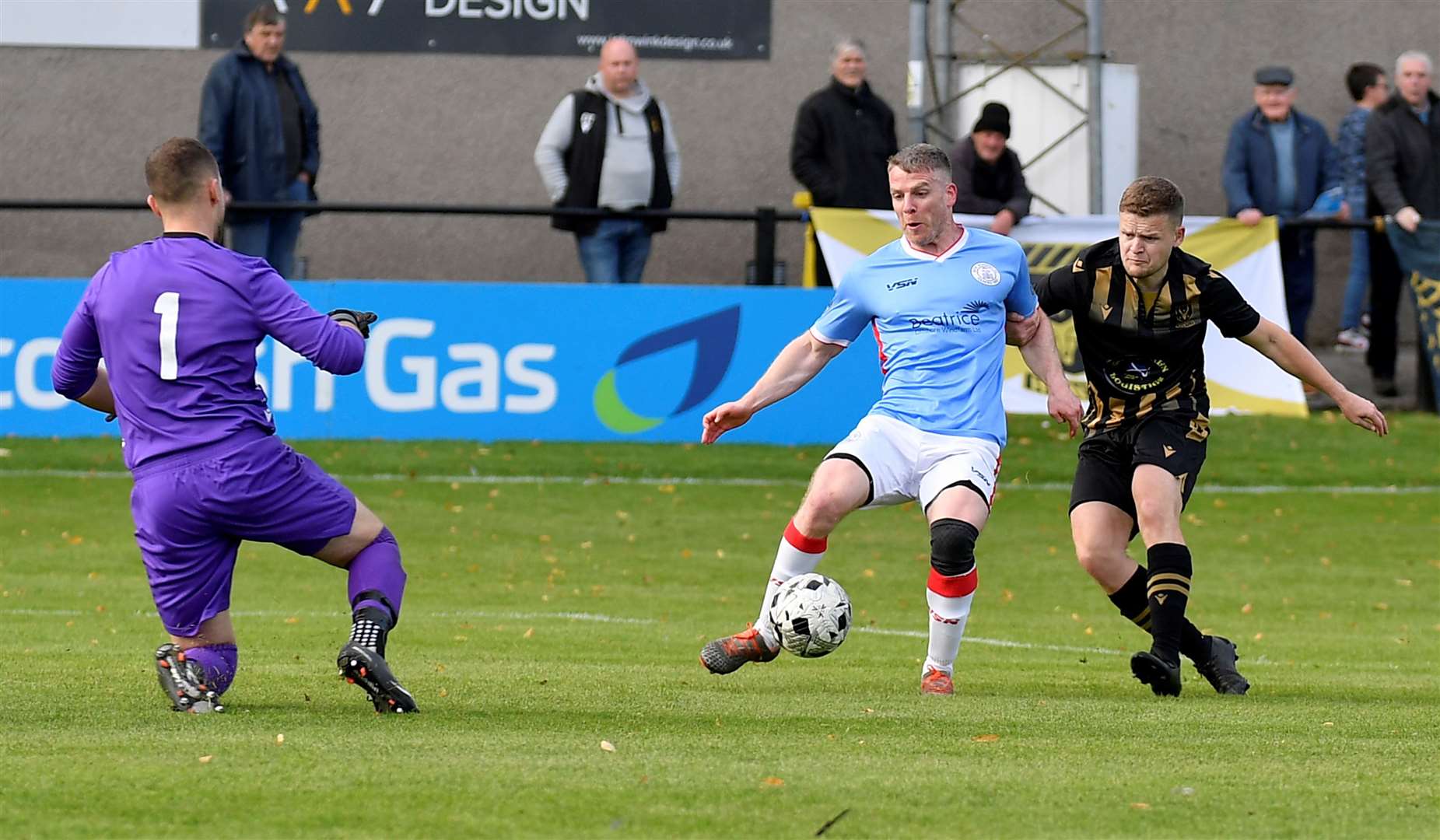 Davie Allan appears to be pulled back in the penalty box by Huntly's Alex Jack. Picture: Mel Roger