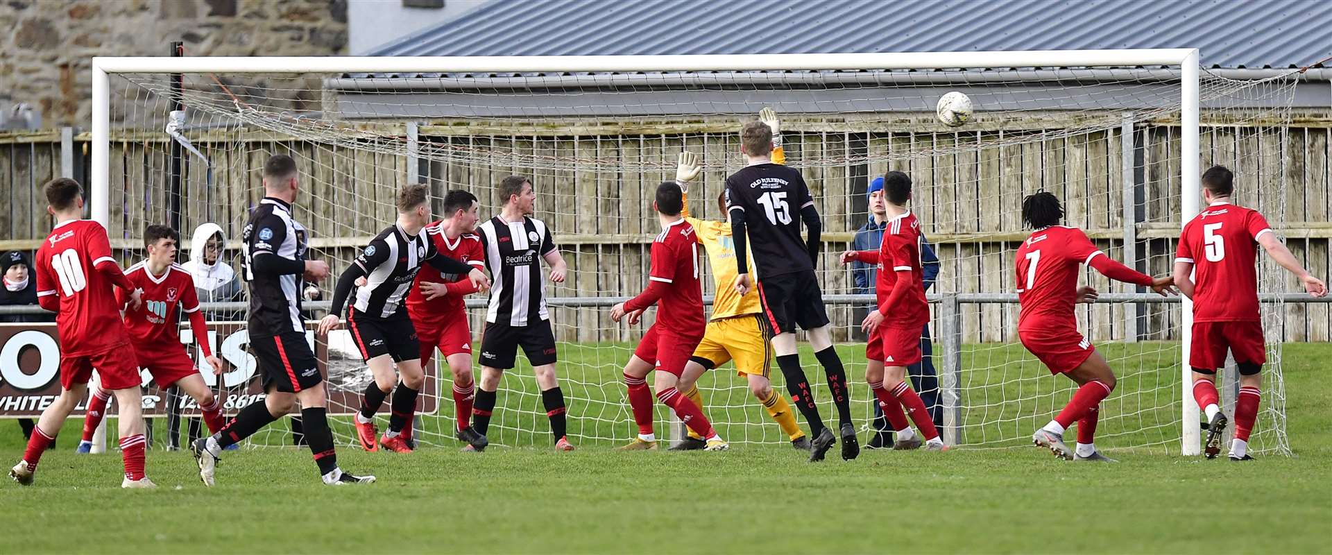 Steven Anderson watches as his header beats Deveronvale keeper Sean McIntosh to open the scoring for Academy. Picture: Mel Roger
